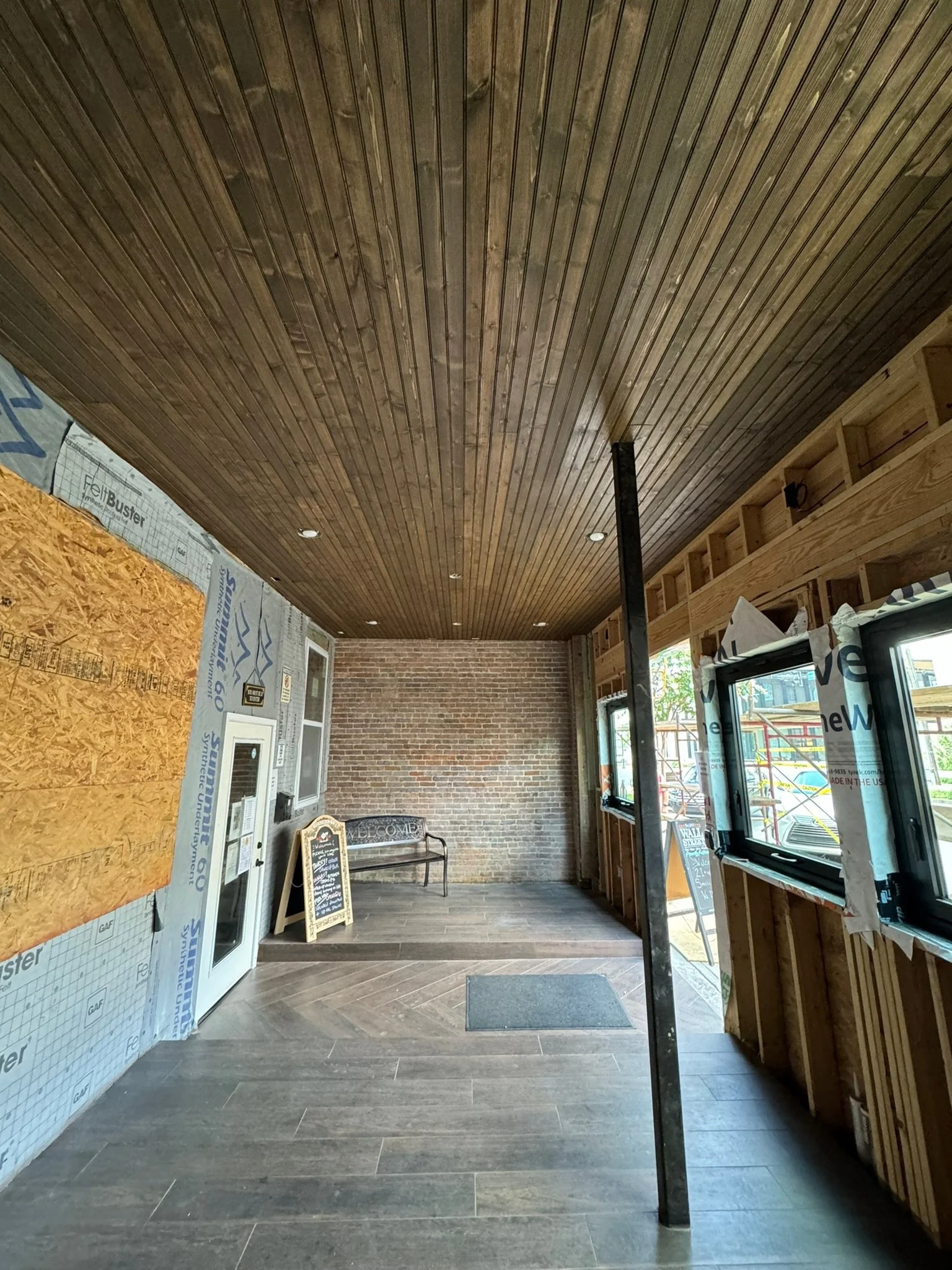 Tongue and groove wood ceiling for a bar on the Murfreesboro town square. Stained/sealed and installed. 
