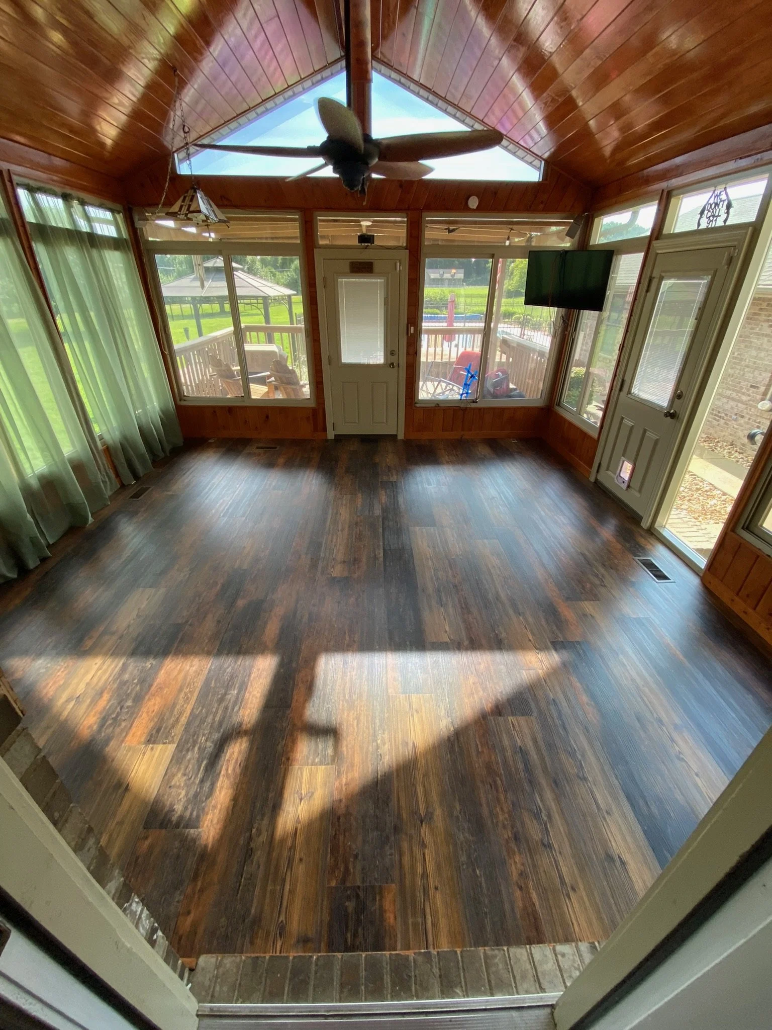Sunroom upgrade - new flooring. 