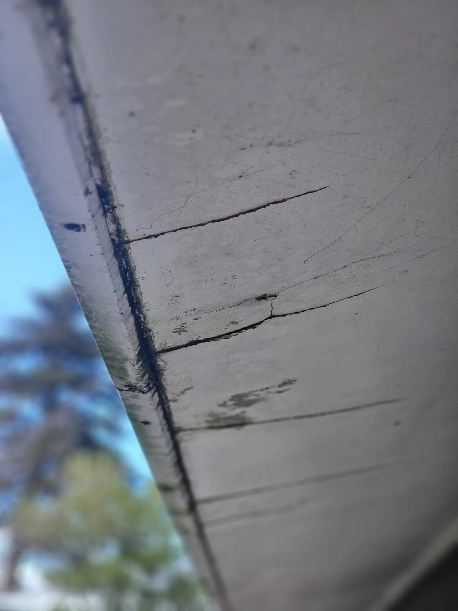 Cracked soffit broken overhand eave