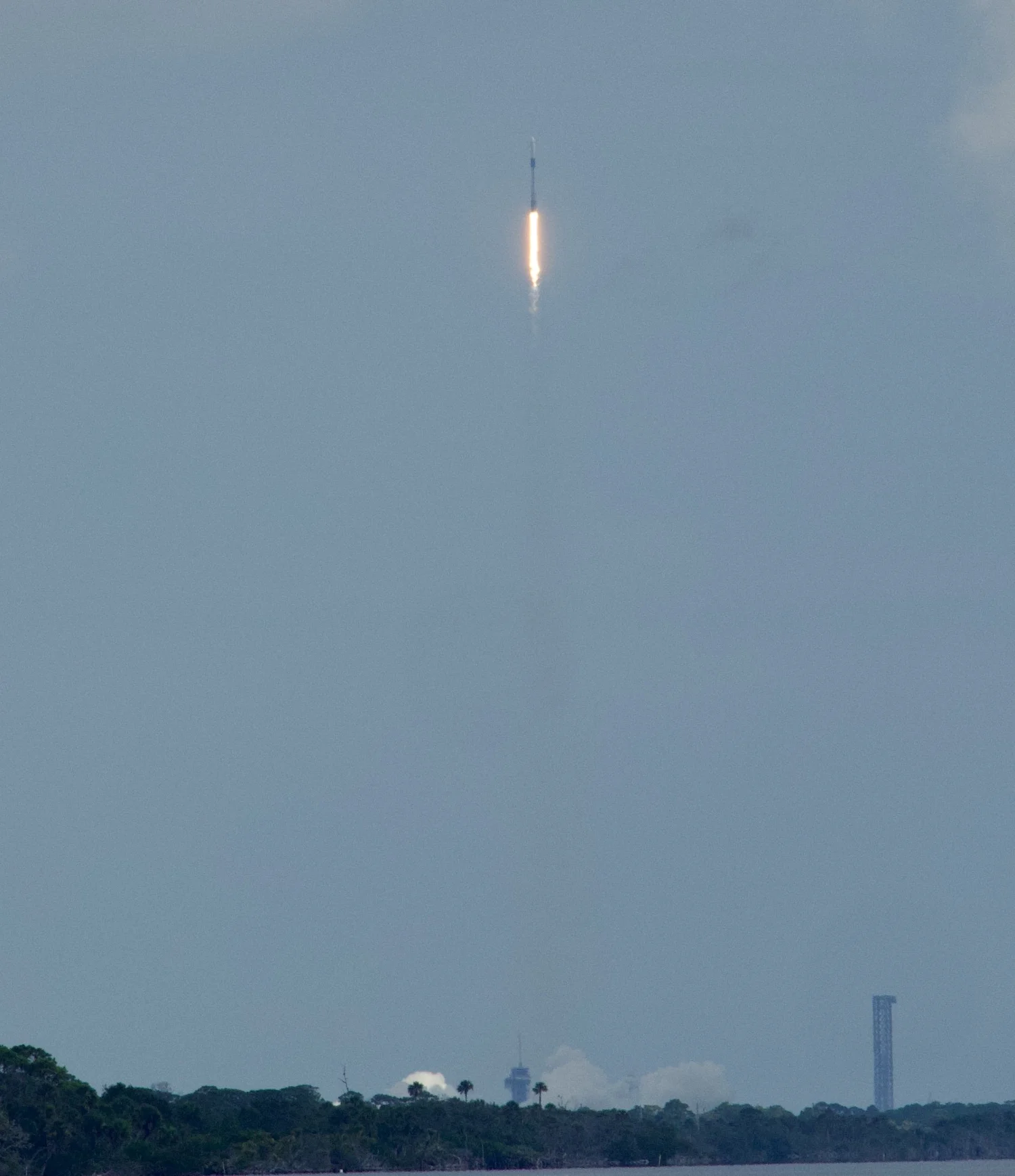 Crew mission rocket ascending from the Florida coast