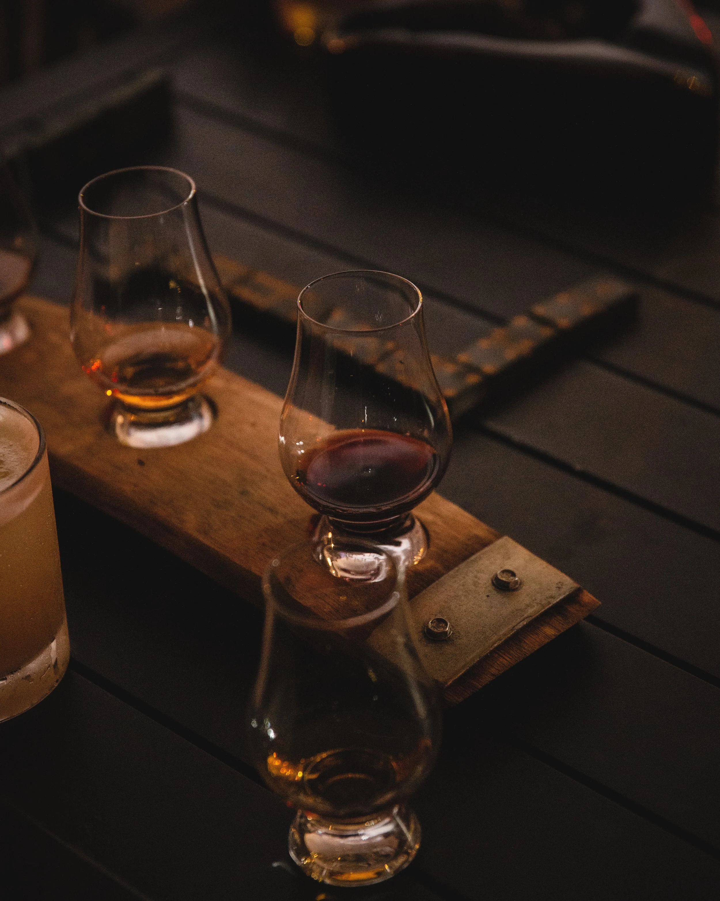 Scryer Rum in glencairn glasses on a sampler tray.