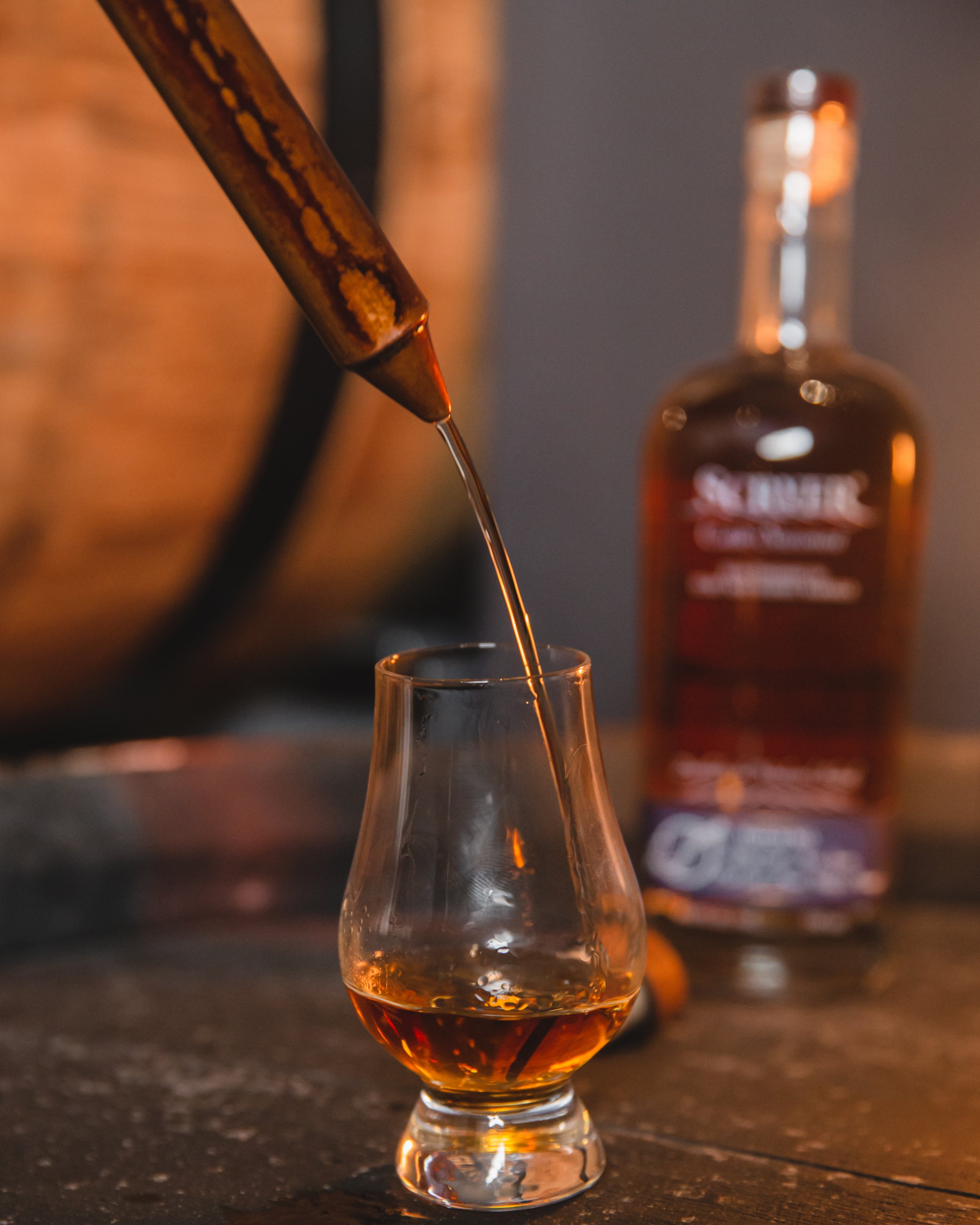Scryer Rum being poured into a glencairn glass