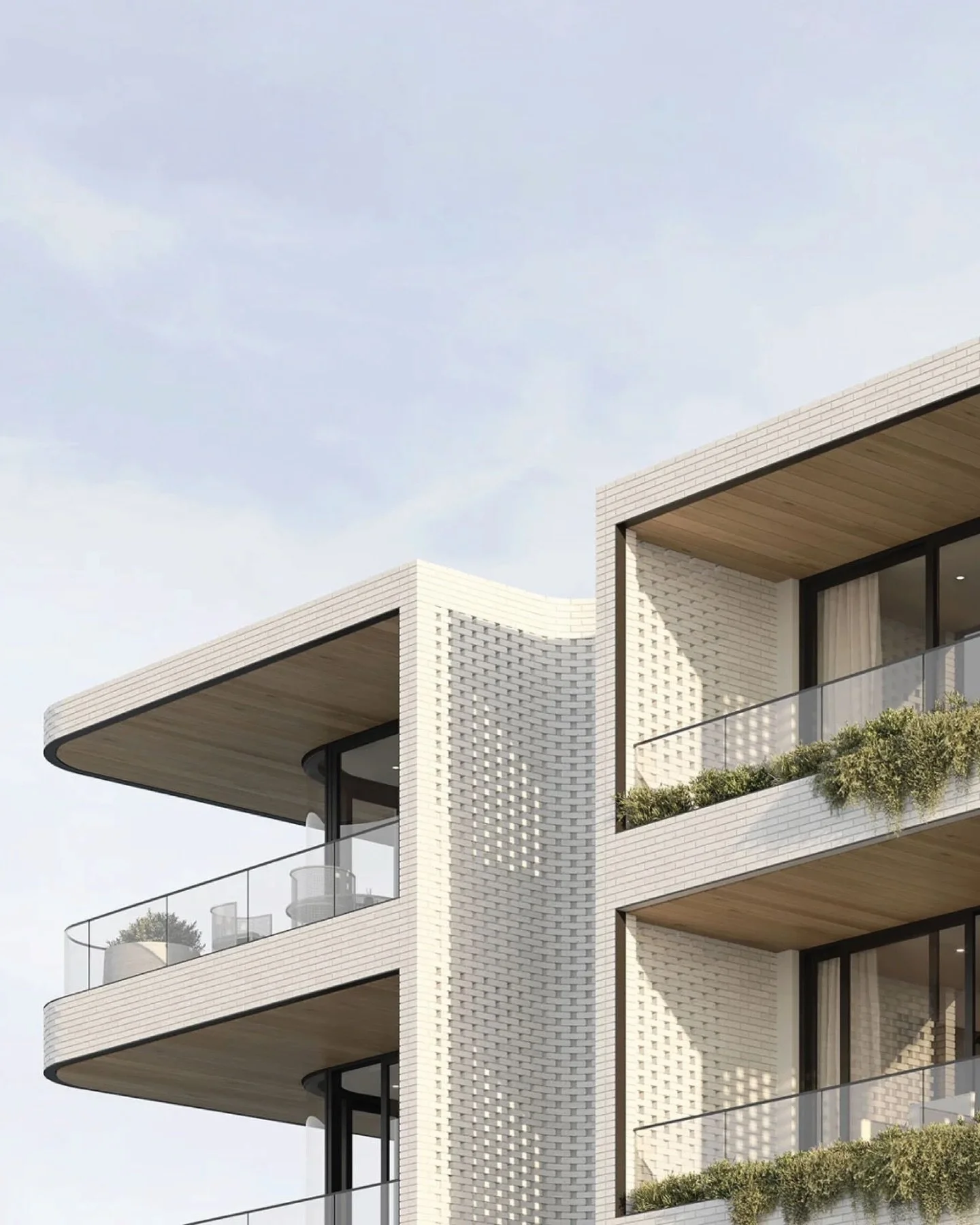 In the heart of Mona Vale, our recently completed MAYA has sweeping curves, white brickwork and a refined palette mirroring the coastline&rsquo;s sculptural movement. Dappled light filters through the crafted brickwork, and gardens wrapping the facad