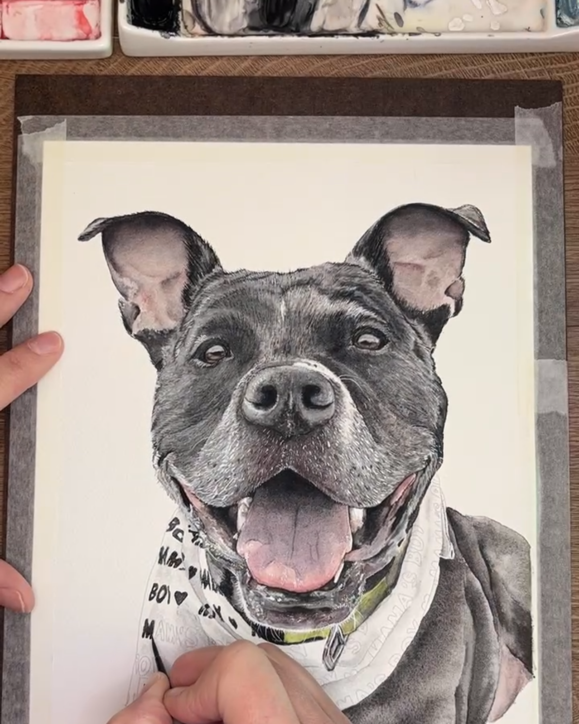 Adorable smiling dog wearing a bandana
