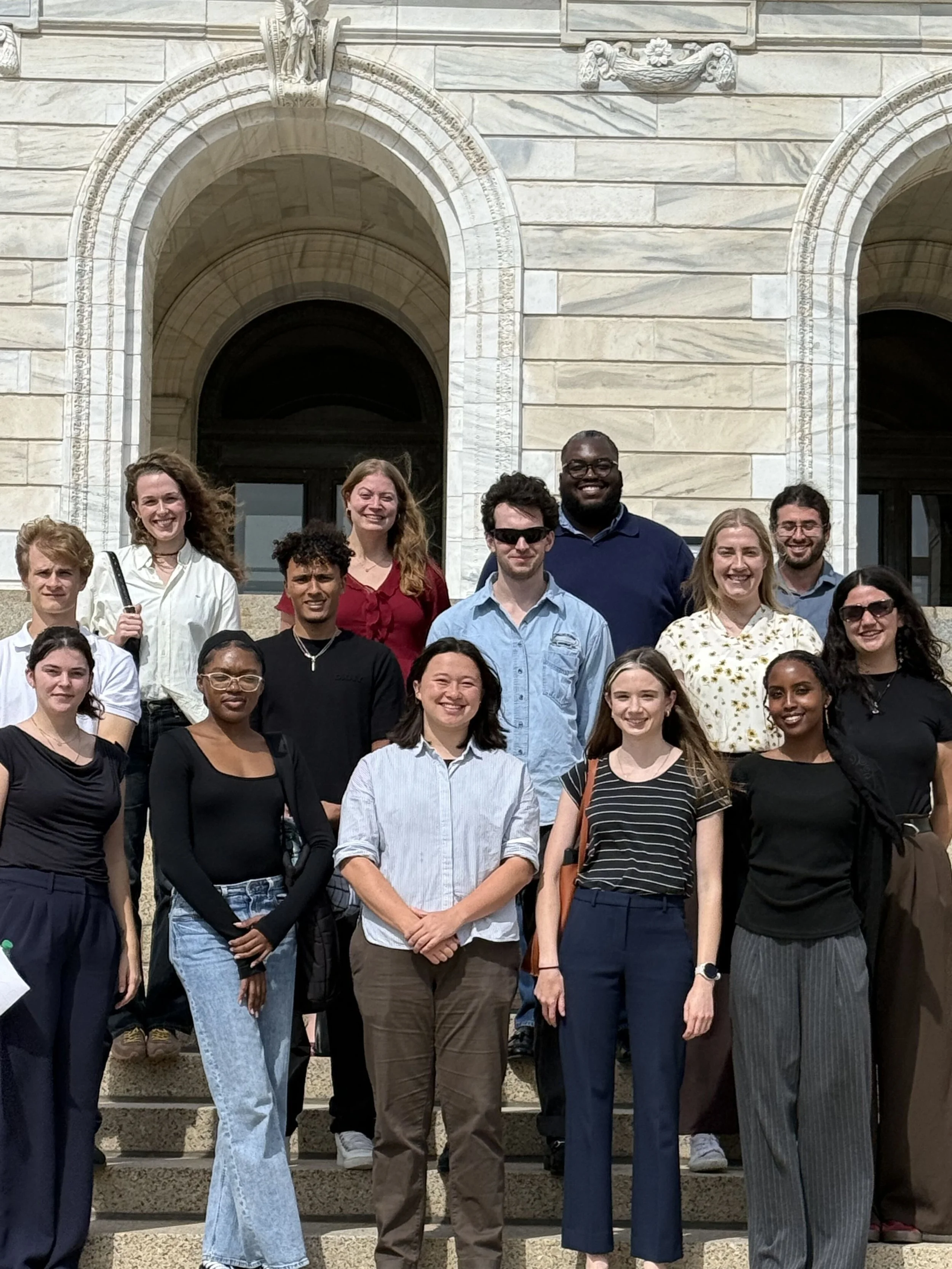 The Fellows smile on the steps of the State Capitol.