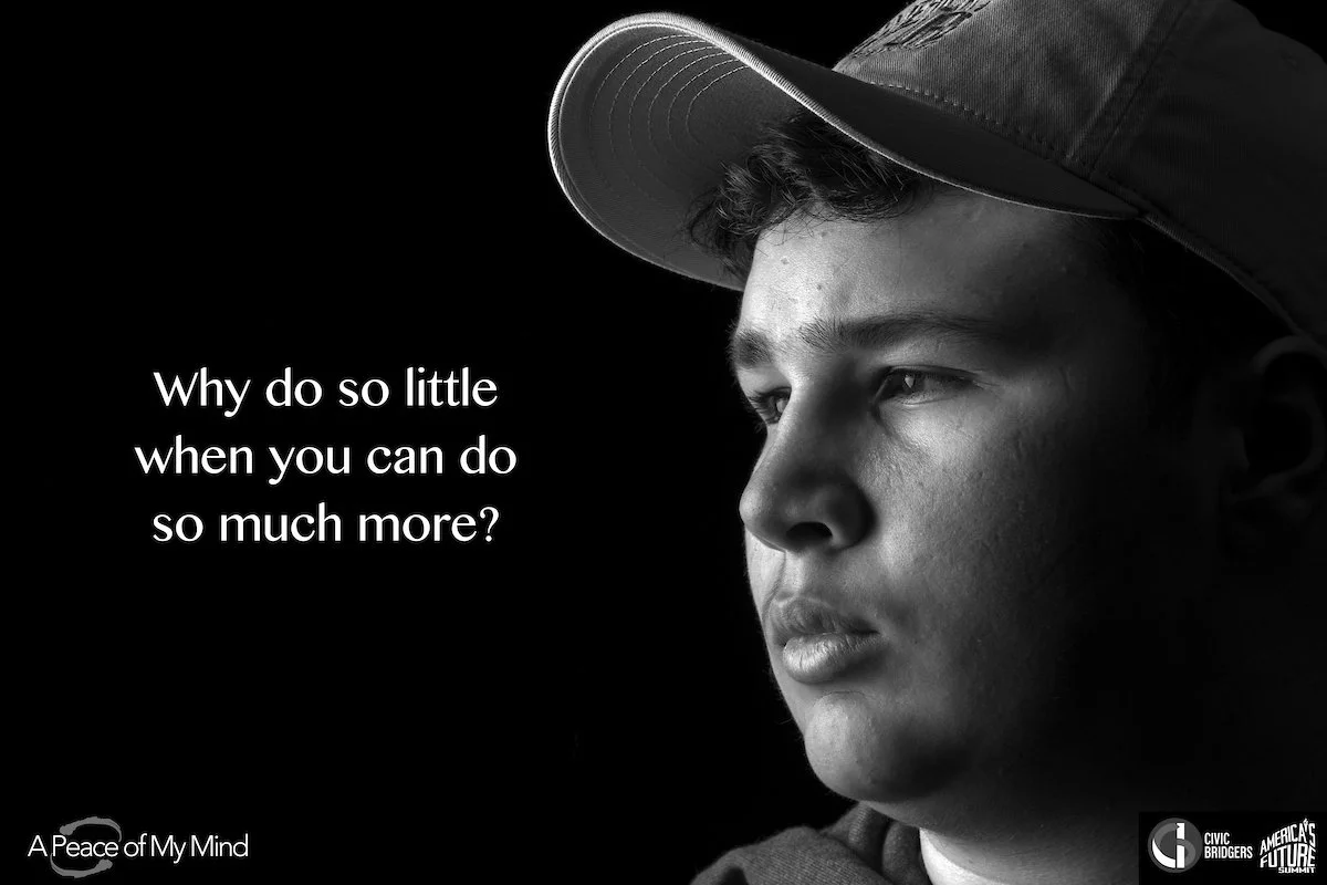 A black and white student of a teen looking into the distance. White text on black: Why do so little when you can do so much more?