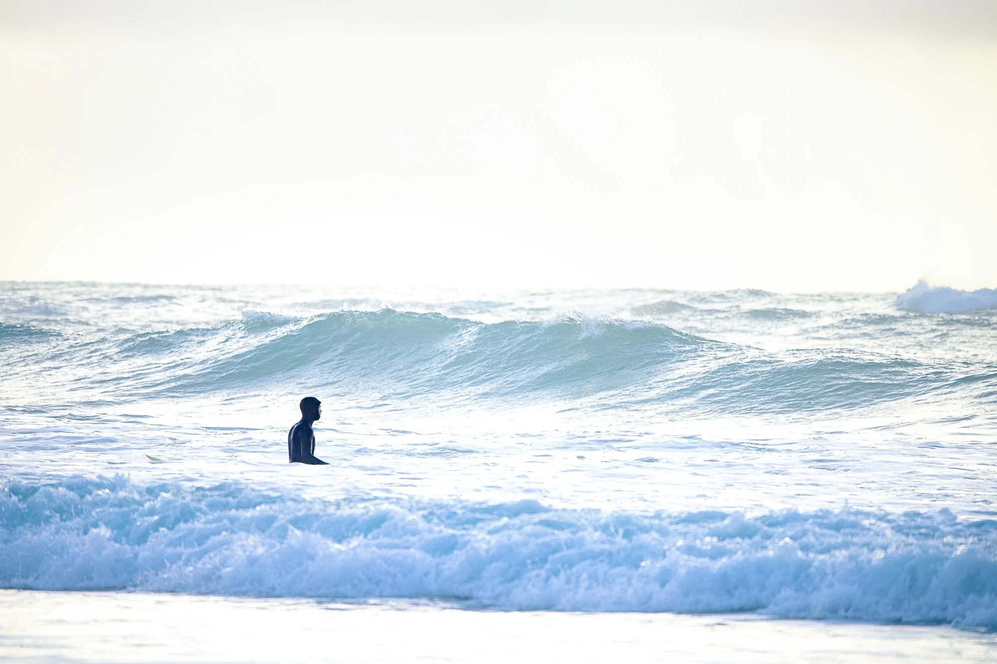 Surfer at Long Beach Tofino BC
