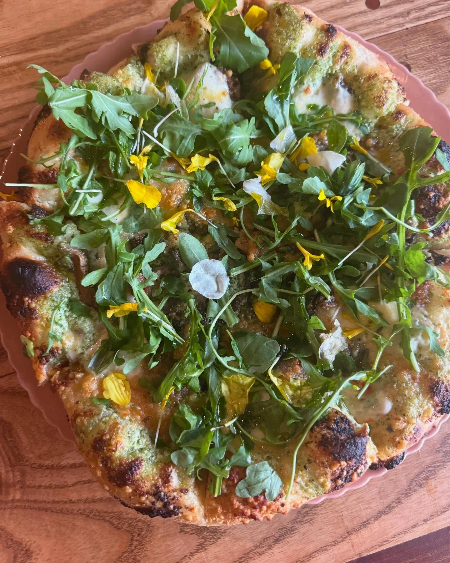 Meet Daisy! Named after our &lsquo;69 #vwbus.. this new flat is topped w pesto ricotta mushrooms fresh mozz parm roasted garlic fresh arugula and edible flowers and @napavalleyoliveoilco EVOO