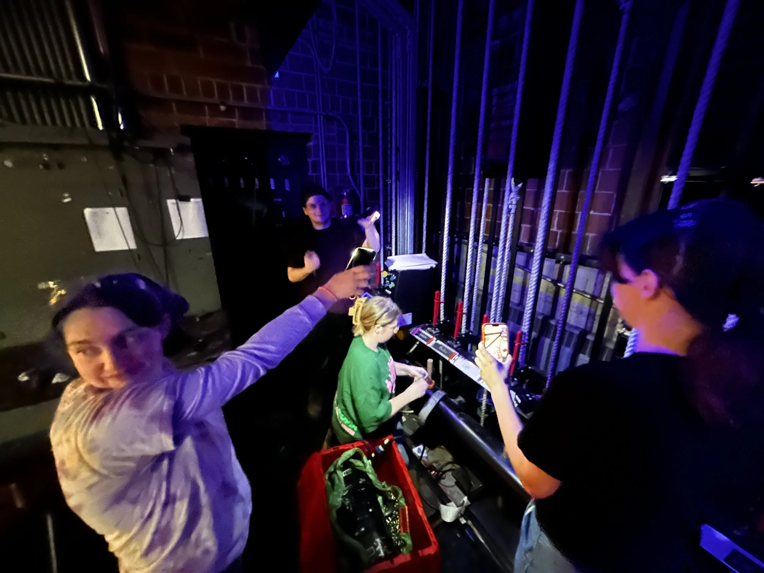 My crew supporting me using a chain motor to rig the overhead pieces.