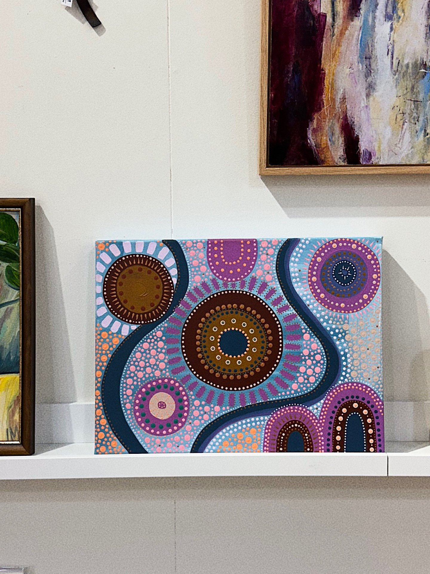 Laurie’s customers, Fernando and Kate embracing by the lake on their wedding day.