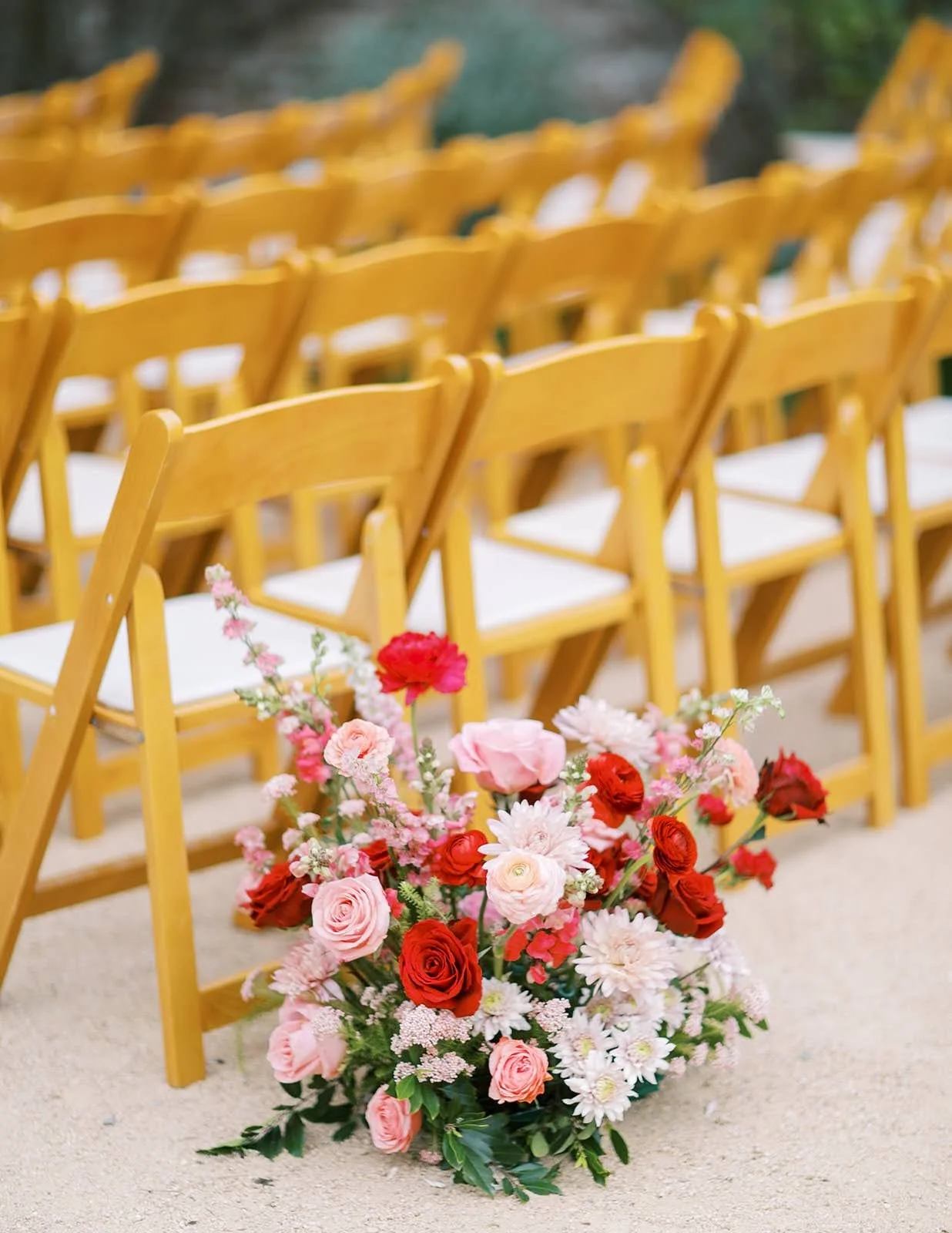 close up of red and pink flower meadow for outdoor wedding in orange county