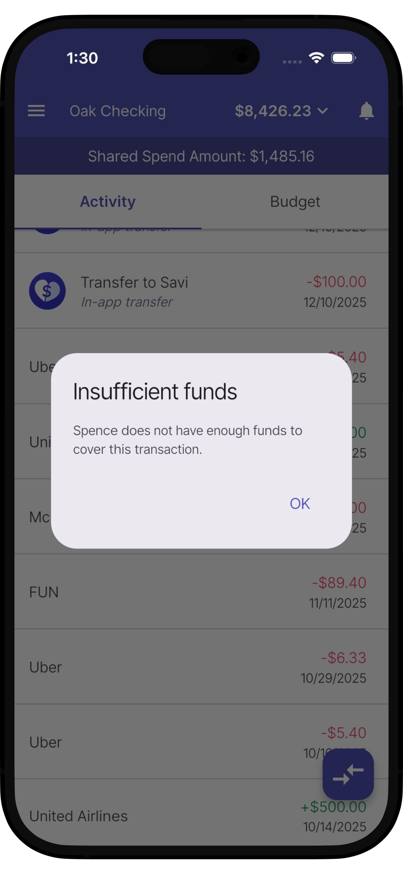 Mobile banking app screen showing insufficient funds error after an attempted transaction, with account details and transaction history in the background.