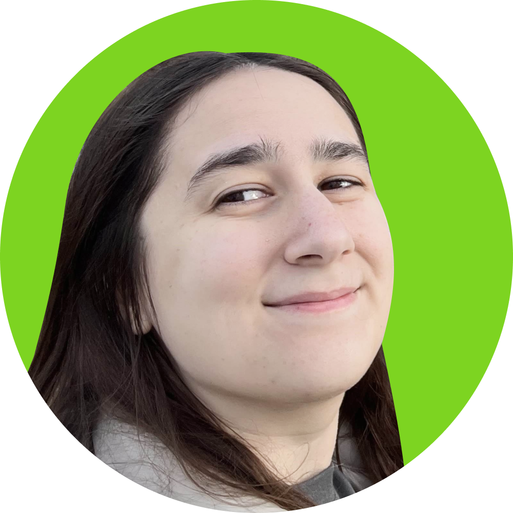 Close-up of a young woman with long dark hair, smiling slightly, with a bright green background.