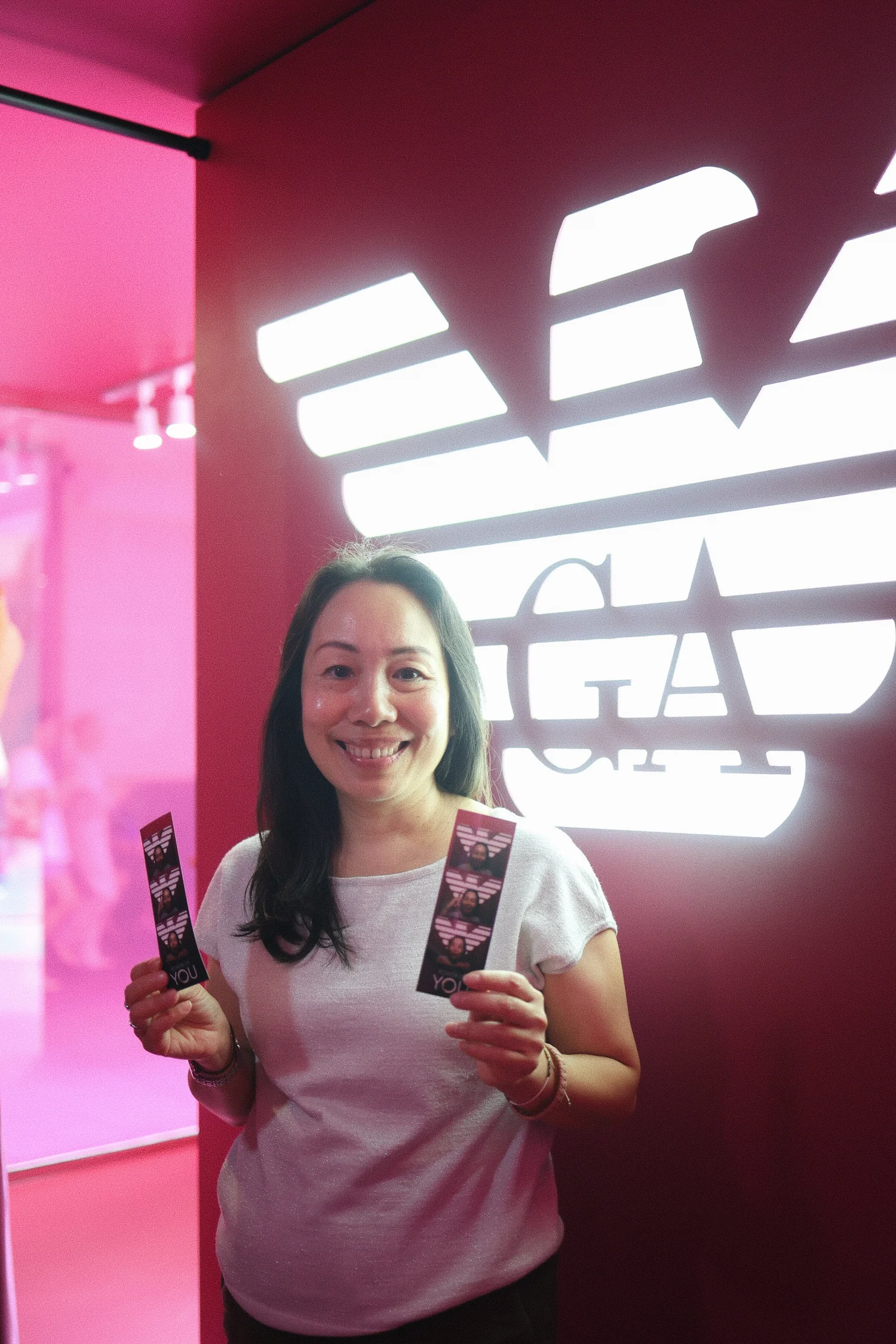 Guests interacting with Armani branded photo booth at Sydney activation
