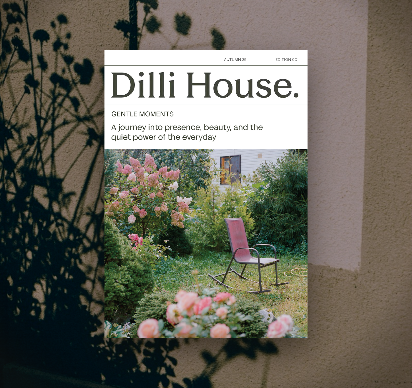 illi House Gentle Moments guide resting against a sunlit plaster wall, with the shadow of wildflowers falling across it. The autumn cover shows a rocking chair in a flowering garden.