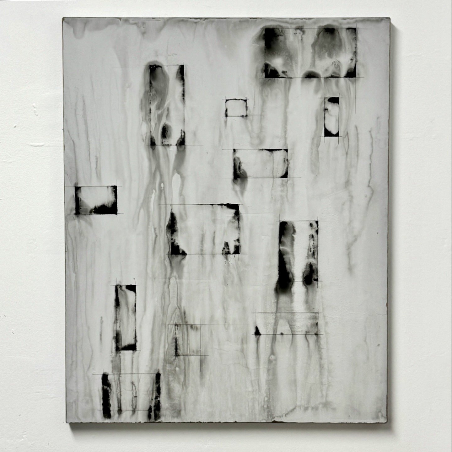 Abstract artwork with black and white dripping paint and rectangular shapes on canvas.