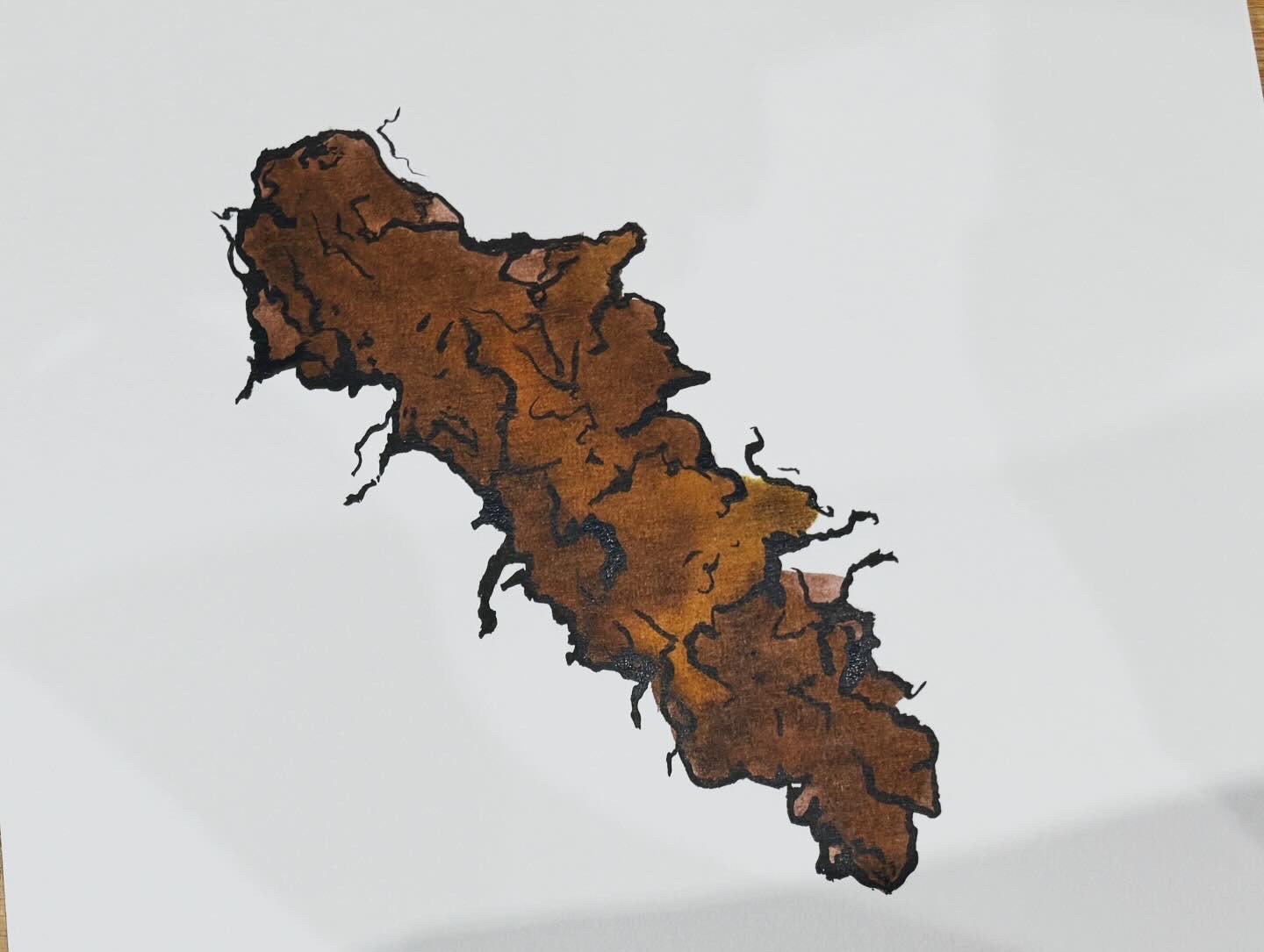 Illustration of the country of Malta with a brown shaded map and black outline on a white background.