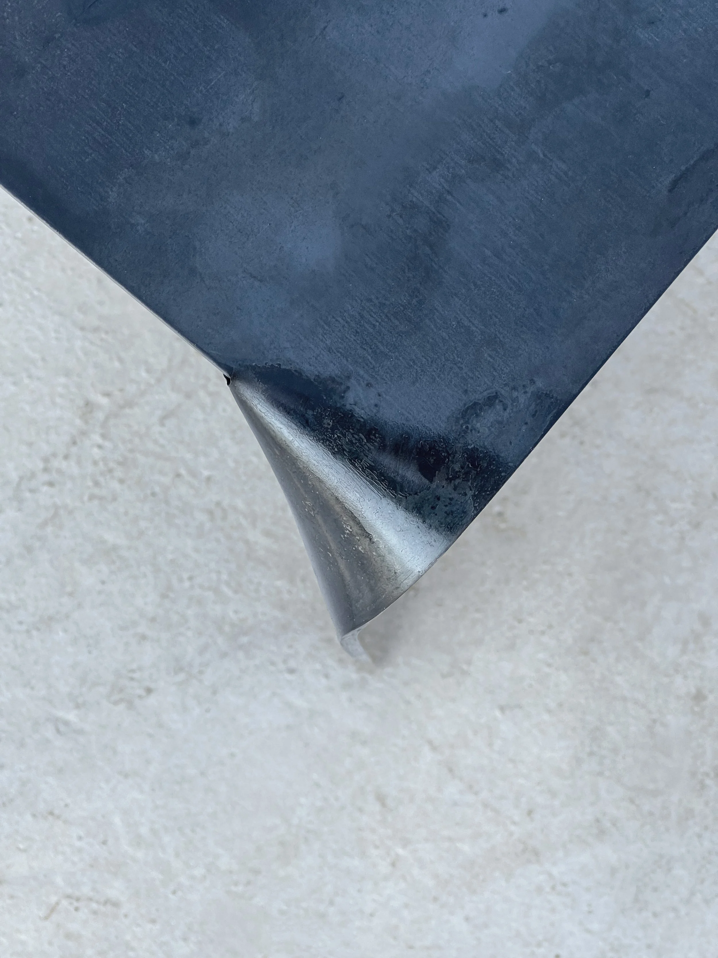 DOA black steel side close up concrete platform.jpg