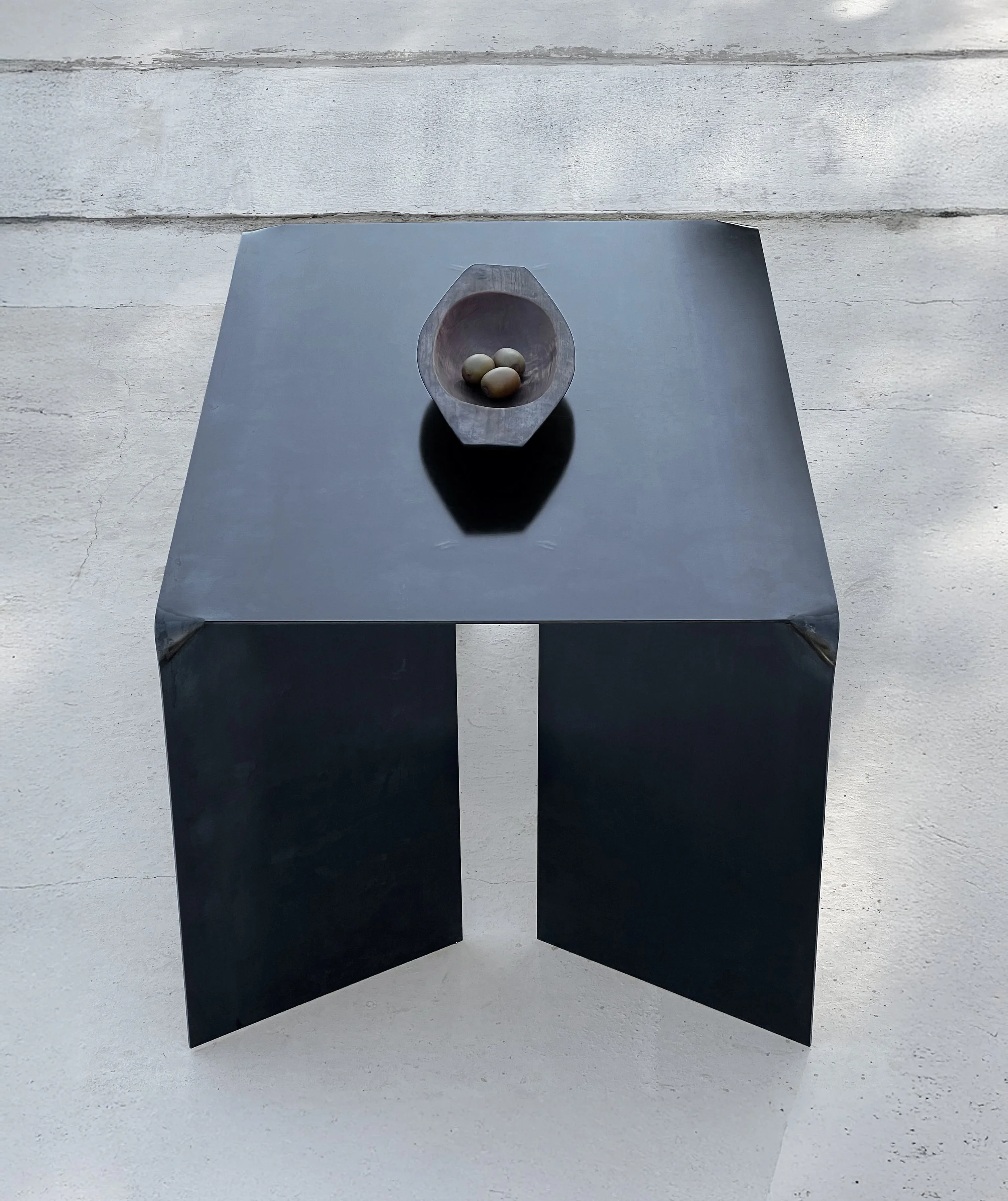 DOA black steel top side vase concrete platform.jpg