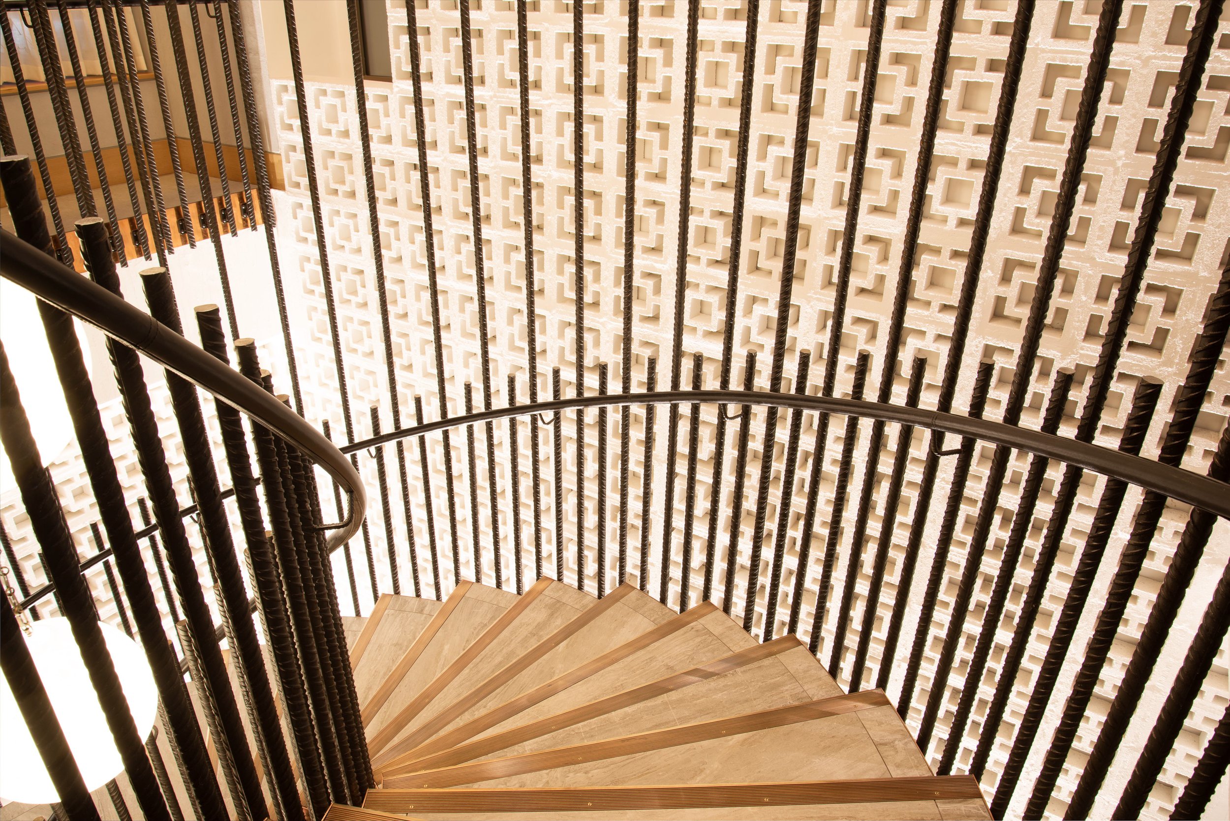 Verrier matching re-bar features with the interior spiral staircase of the hotel