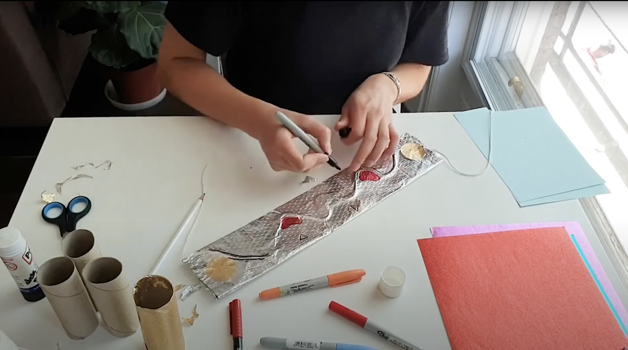 Video still from the RHM Youtube page, showing how to make a belt based on Urartu belts. 