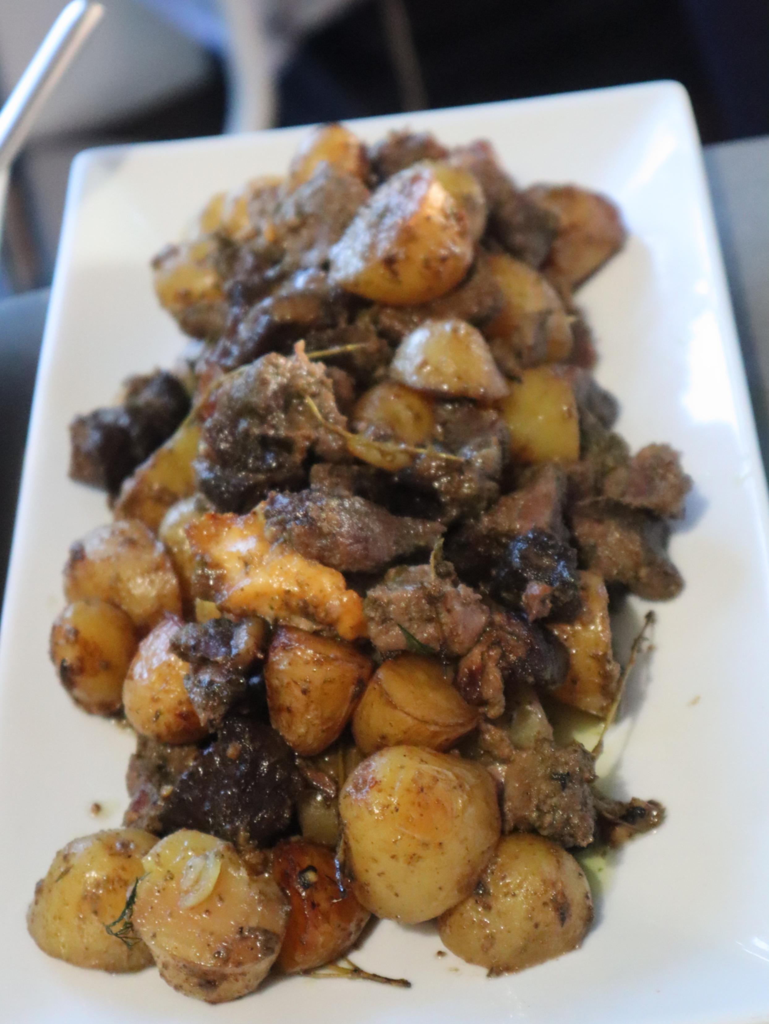Slow-roasted Greek lamb kleftiko with lemon, garlic and herbs.