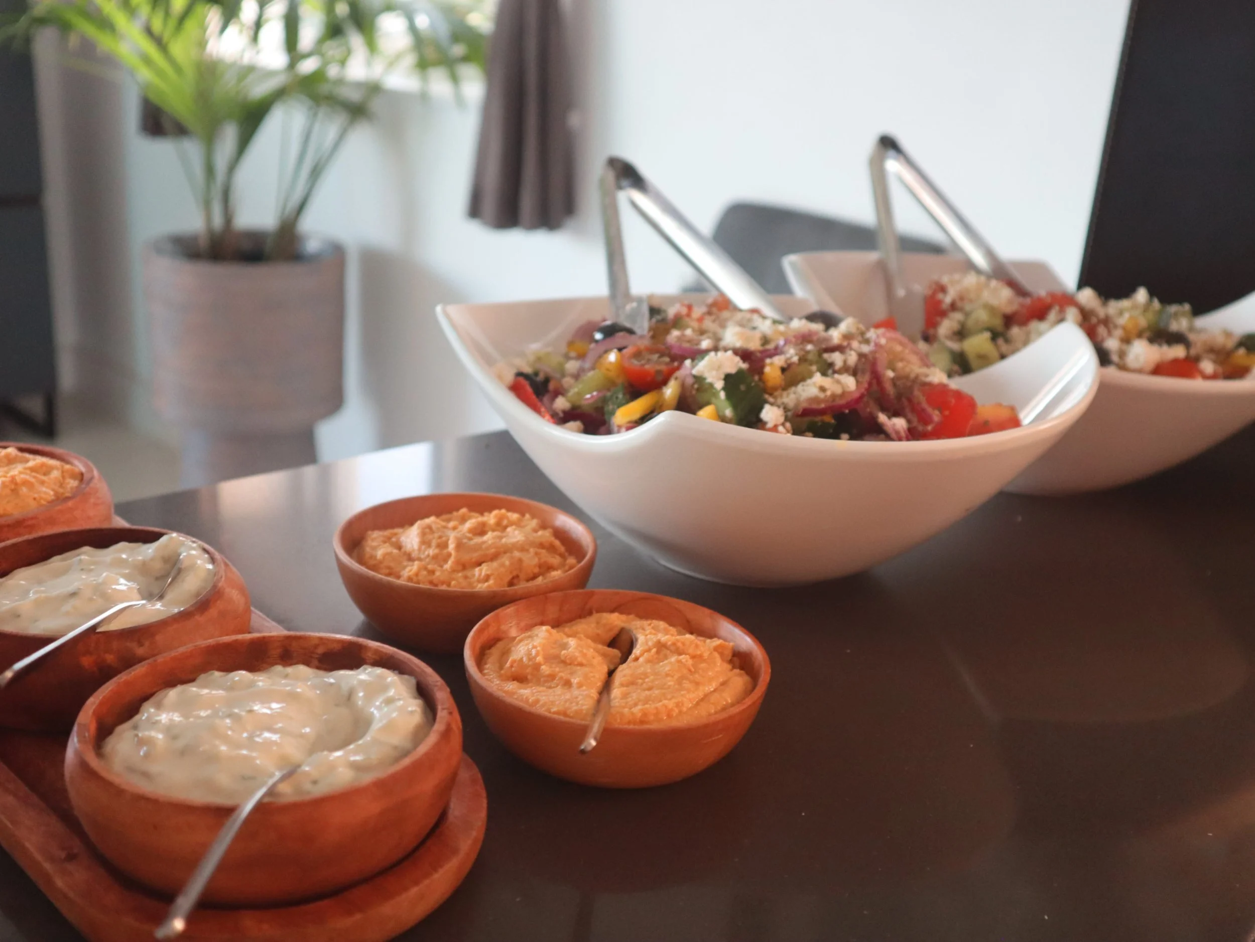 Trio of homemade hummus, tirokafteri and tzatziki served for Greek Tings catering.
