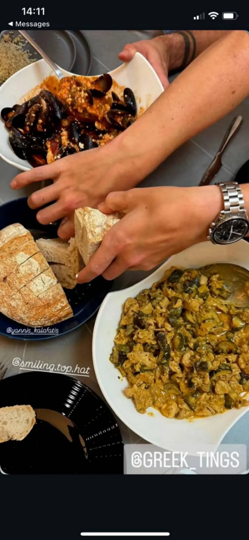 Sharing table with mussels, spiced meat and rustic bread at a Greek Tings private event.
