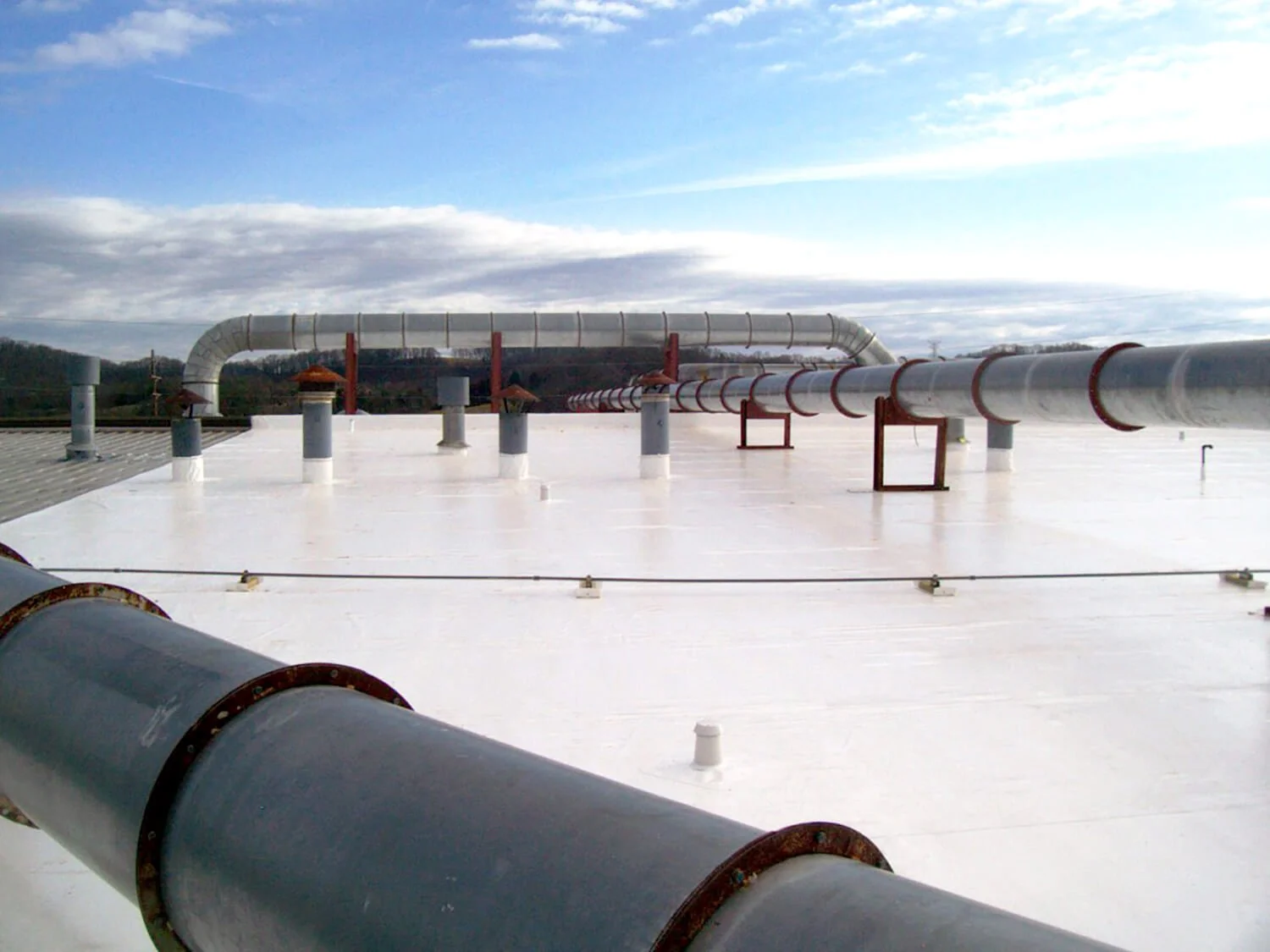 Summer Commercial Roofing Maintenance Tips for Heat