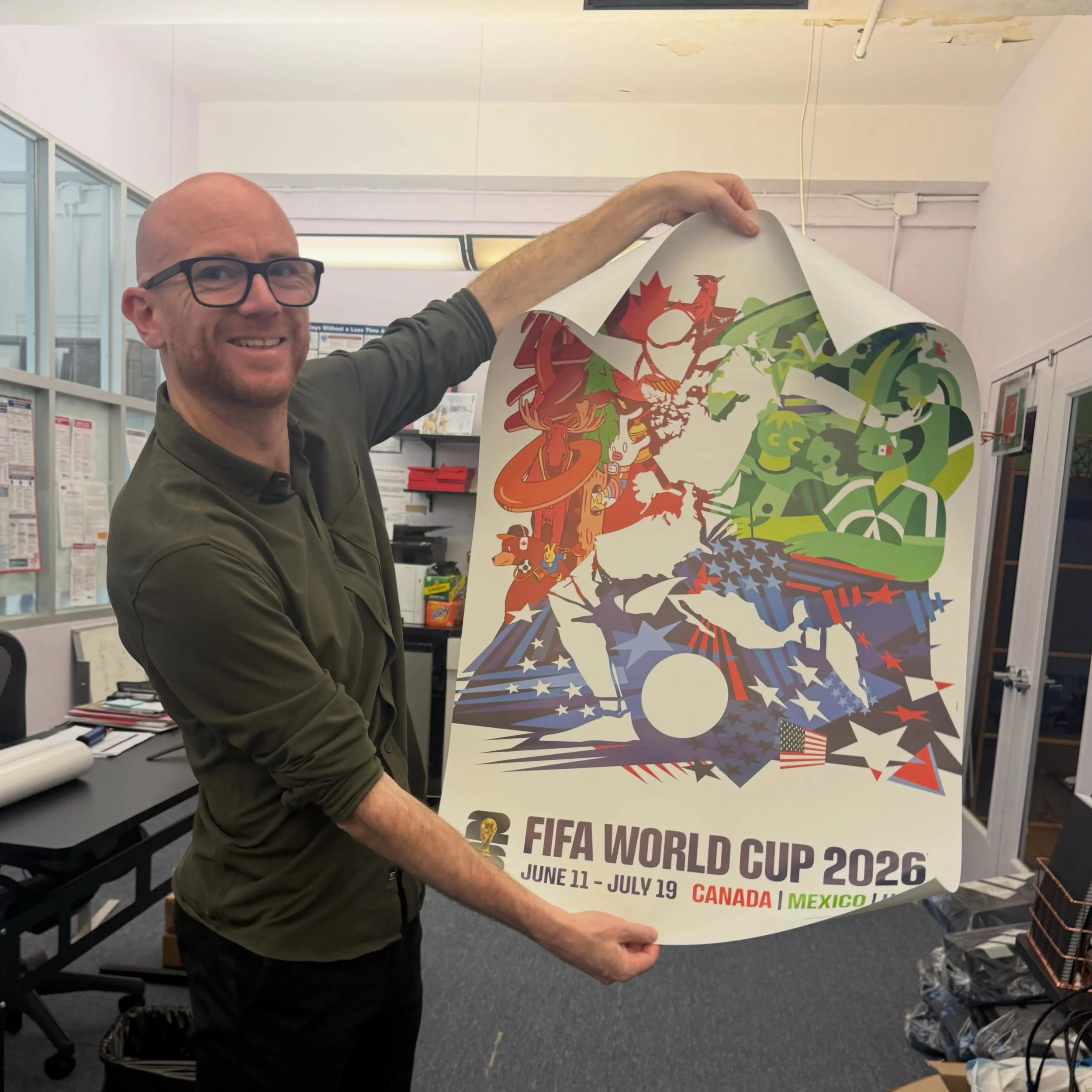 I had the wonderful opportunity to visit the offices of @newyorkscores  a not-for-profit organization that promotes Soccer and Poetry for inner city children.  Here @johnwriordan Executive Director of the organization is holding one of the posters fo