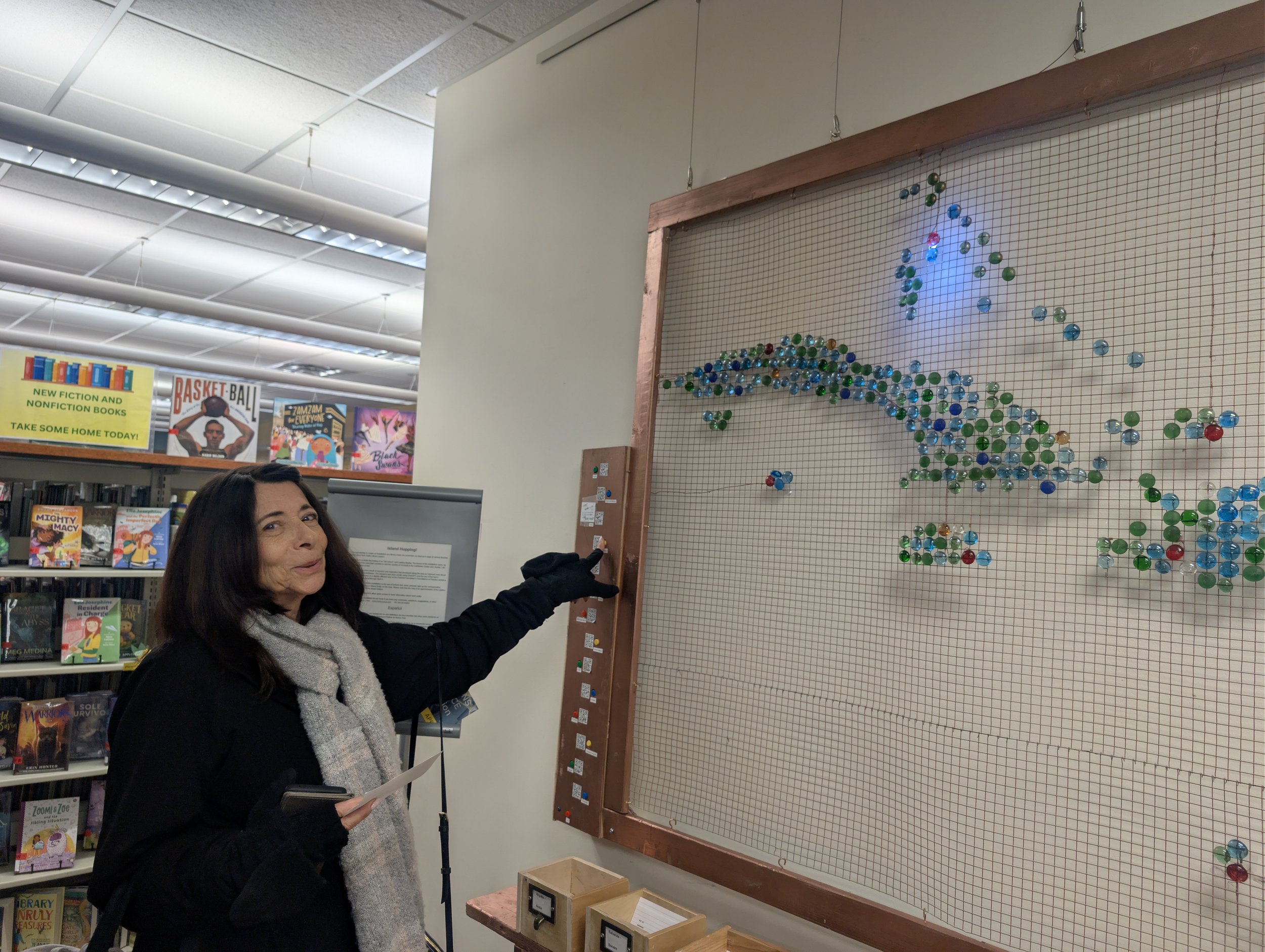 Visitor interacting with installation