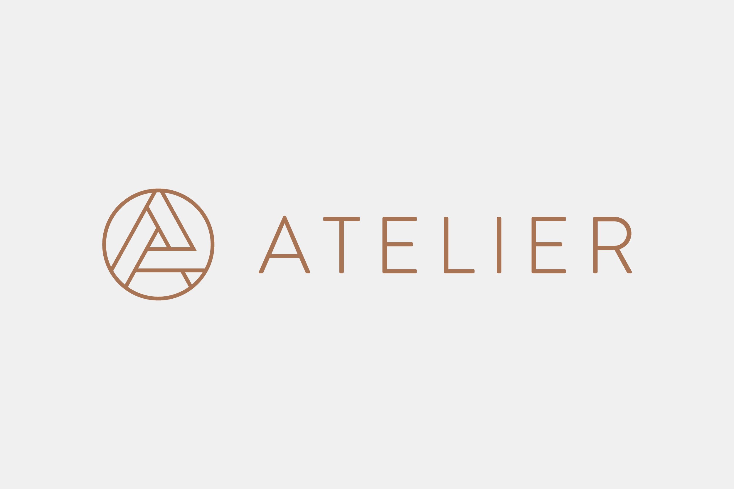 The logo of ATELIER featuring a stylized letter 'A' within a circle, followed by the word 'ATELIER' in minimalist brown text.