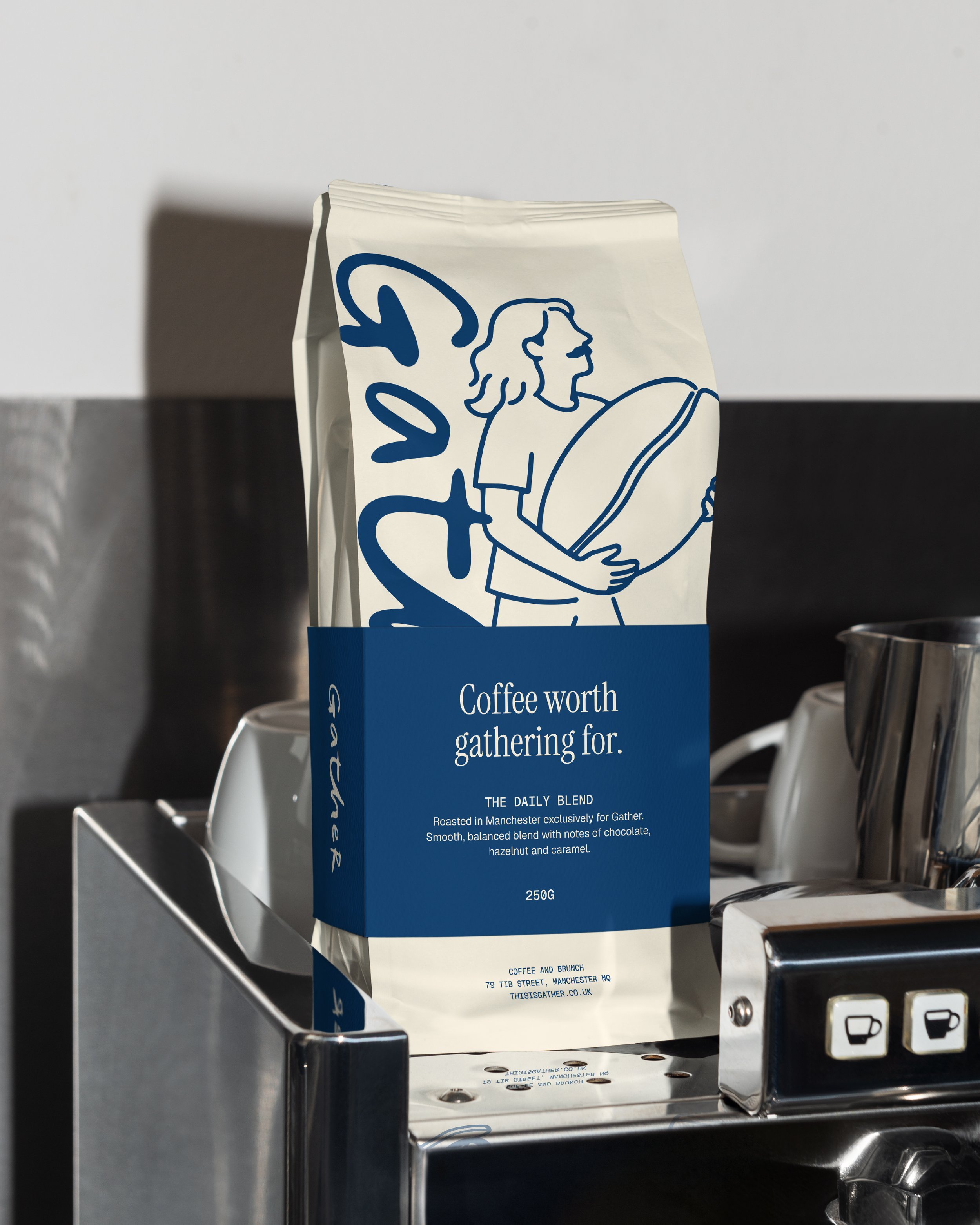 A packaged premium coffee blend on a metal shelf in a store, with a label describing its flavor notes and weight