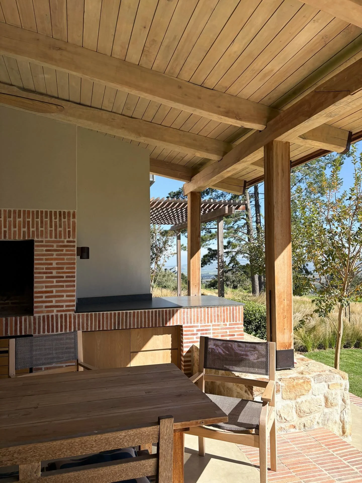 Sunlit timber, quiet shadows and a view that does some talking - countryside calm and outdoor living done right.