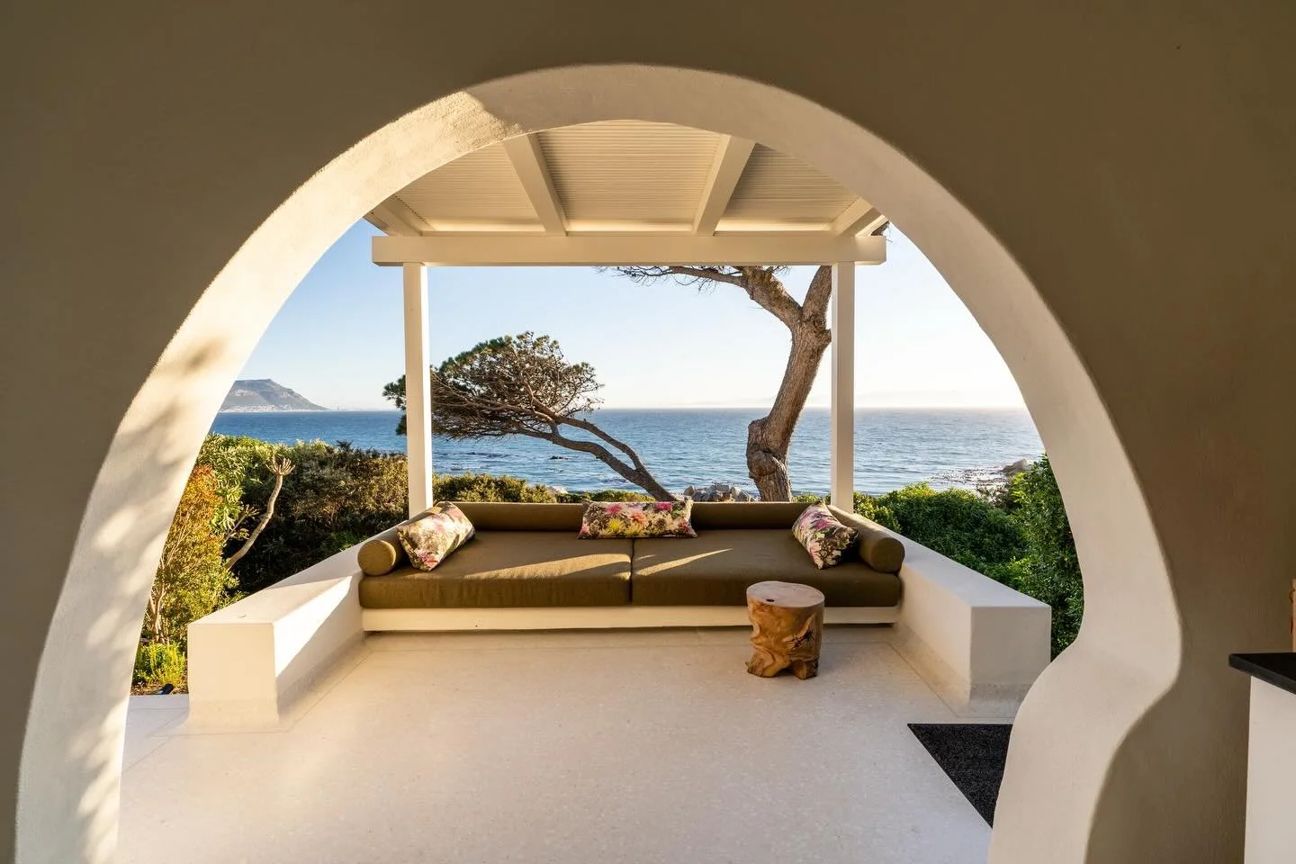 There&rsquo;s a quiet intimacy in these spaces - white plaster openings to the sky, arches that guide you from one area to another, and @andreagraff1 adding soft layers, turning each space into somewhere you naturally want to settle. A home that simp