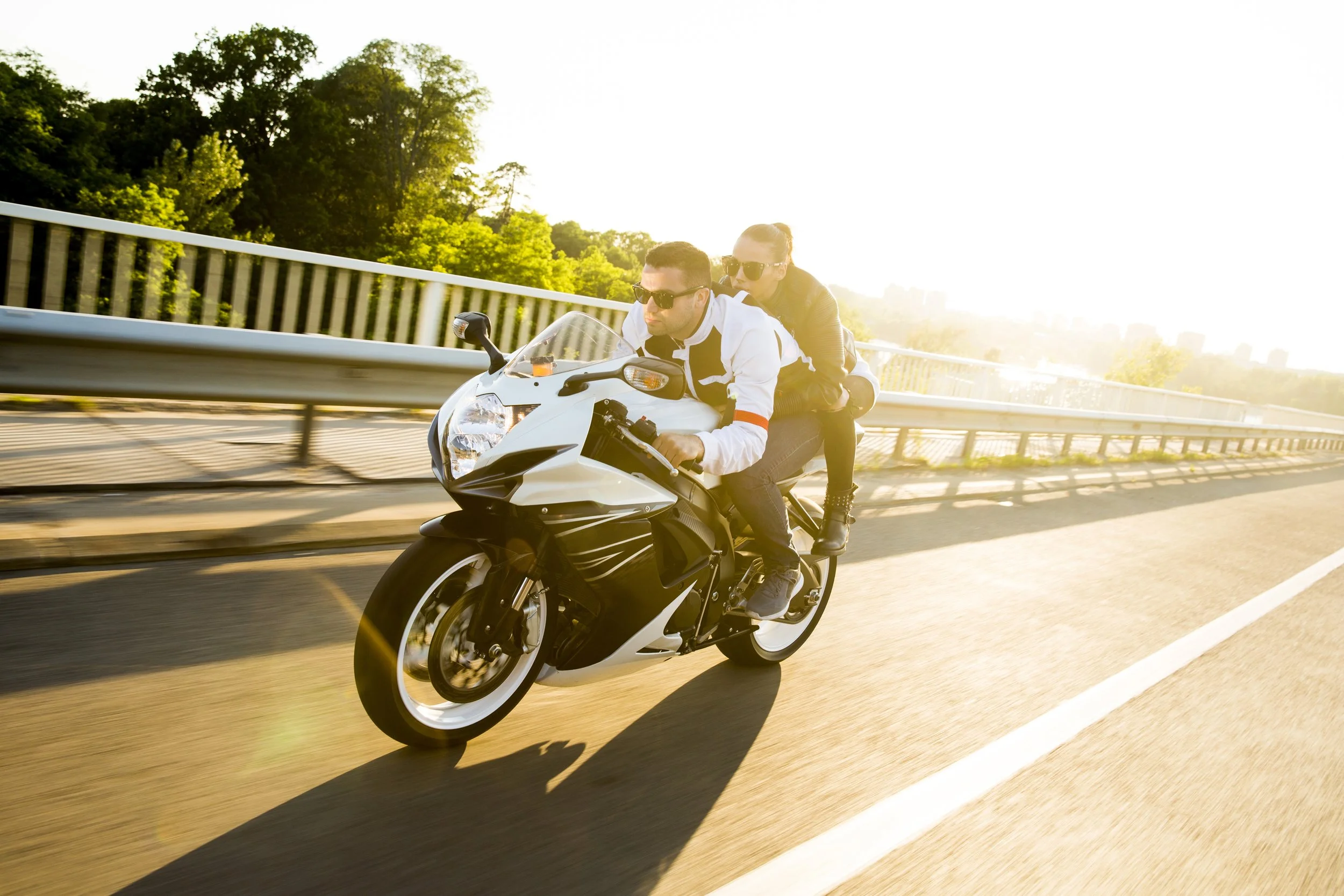 young-man-and-a-woman-on-a-motorcycle-2023-11-27-05-24-41-utc.jpg