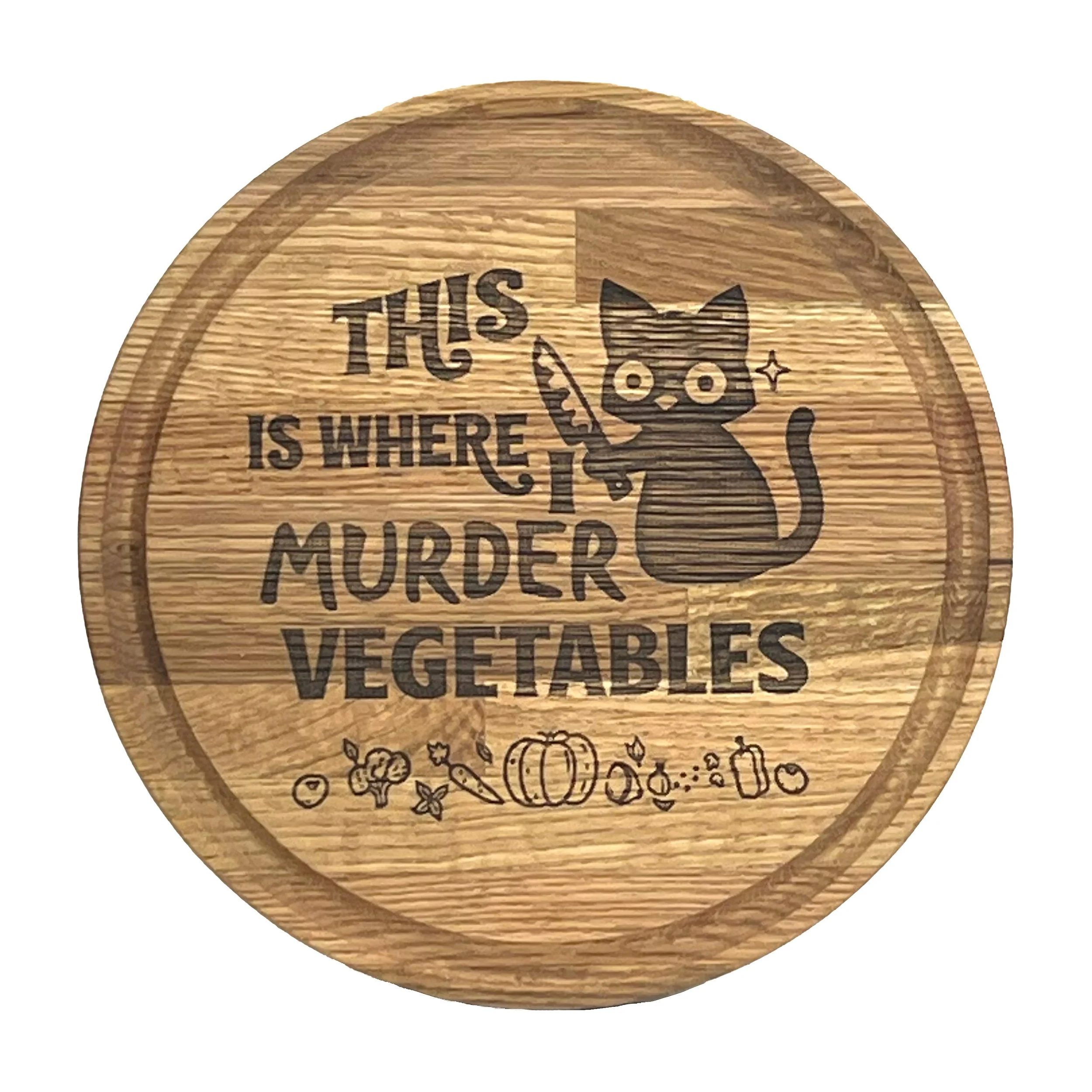 CatCuttingBoardMurderVeg.jpg