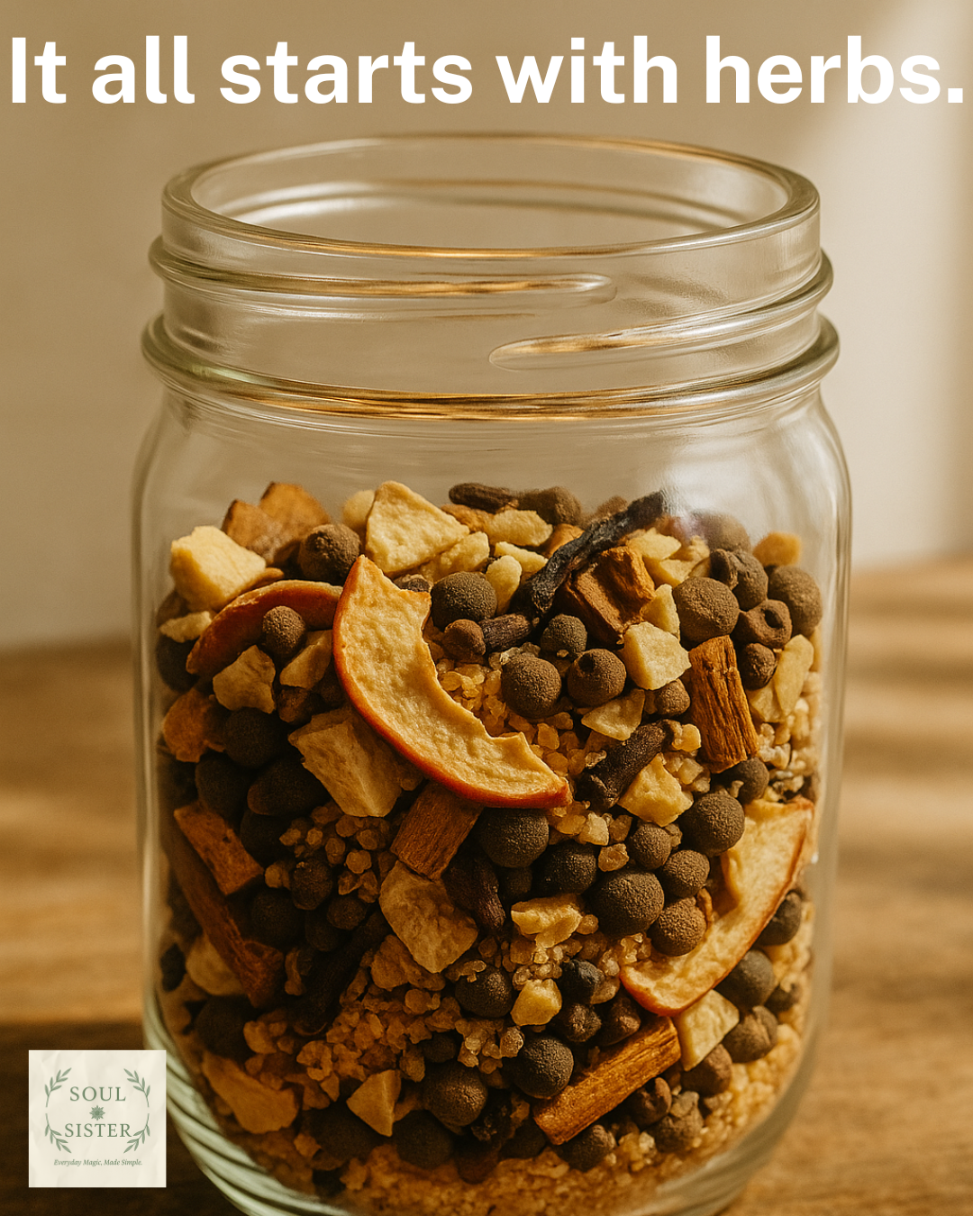 A glass of caramel apple infusion cocktail on a wooden surface, surrounded by autumn leaves, with a mason jar of trail mix and a pumpkin patch in the background.