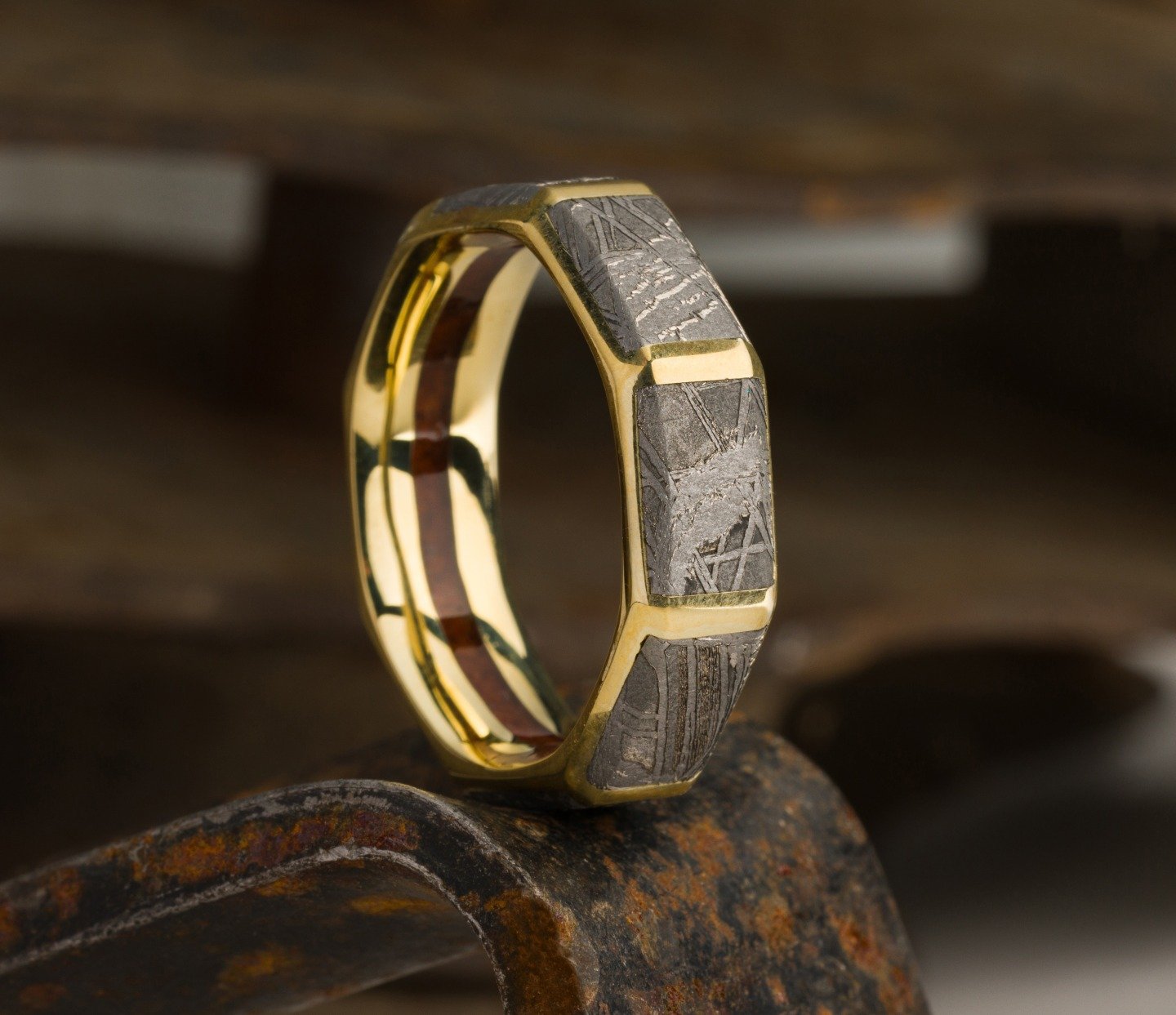 Halloween is full of skeletons, and dinosaur bones fit right into that category. 🦴🎃 This 18K Gold band features Meteorite and Red Dinosaur Bone inlay! 

- The Lashbrook Builder never fails to make cool, custom rings. Come by Jamie's today!! #jamies