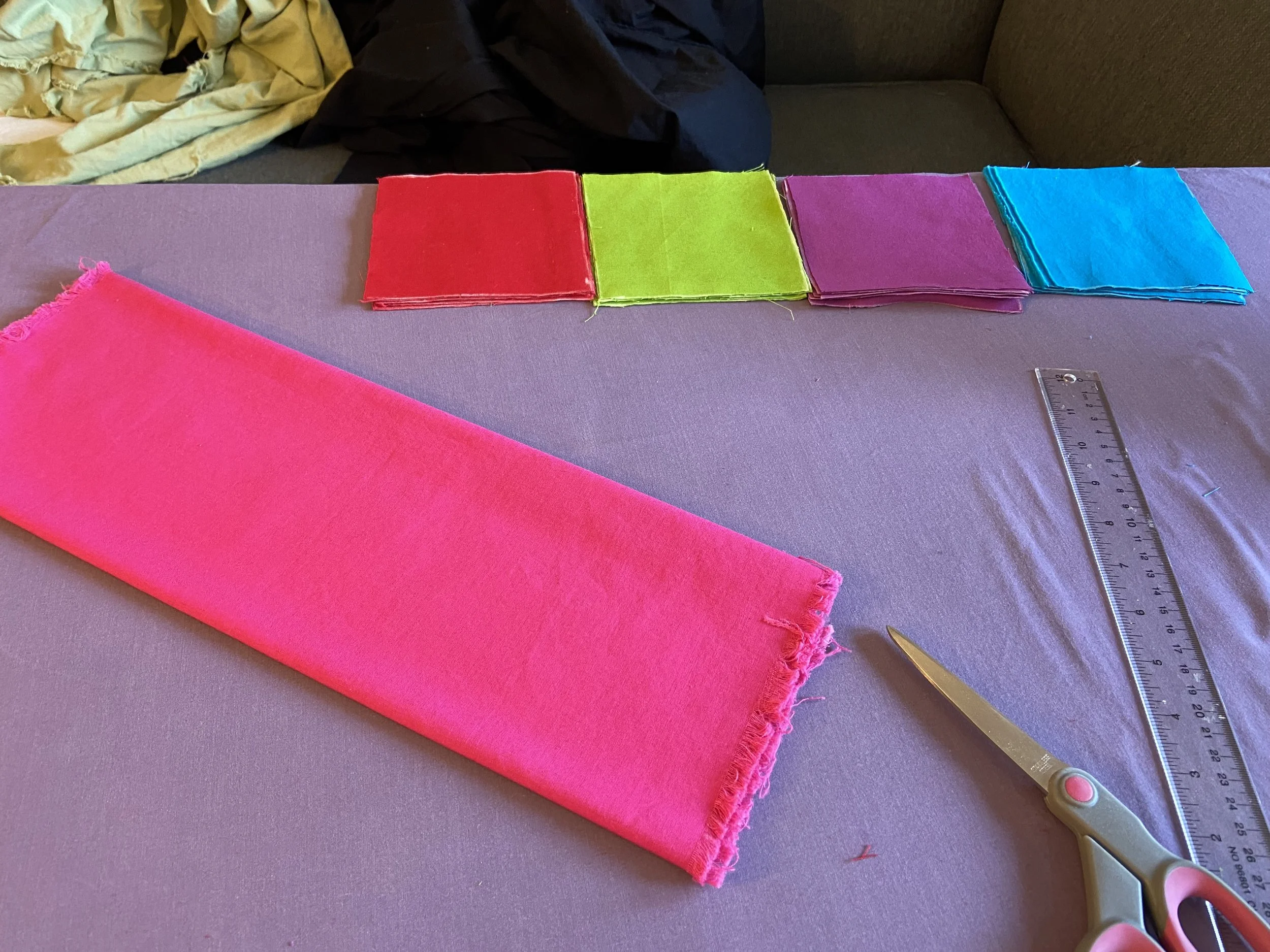 Cut Fabric Squares.jpeg