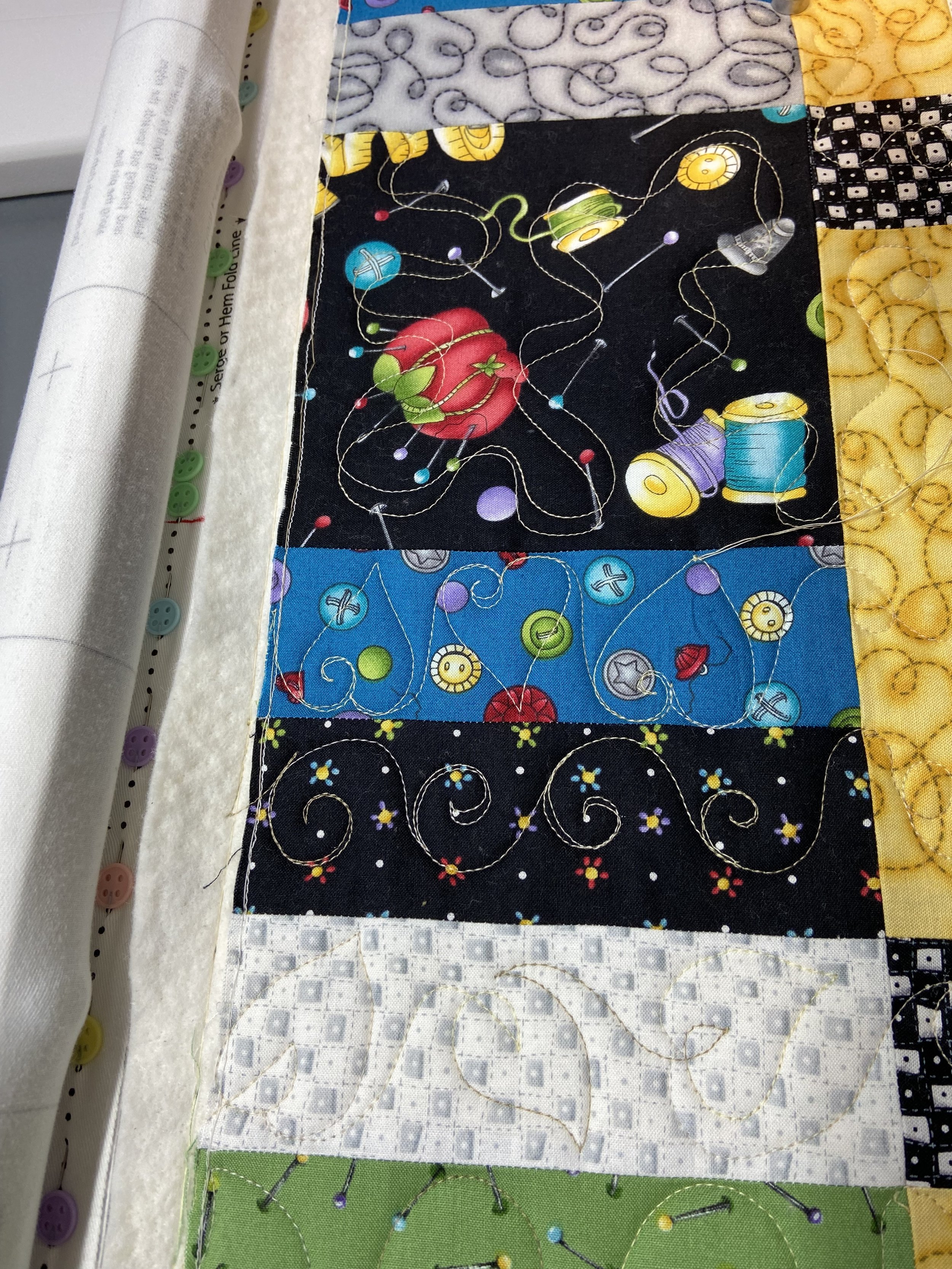 "Sampler" stitching in the border