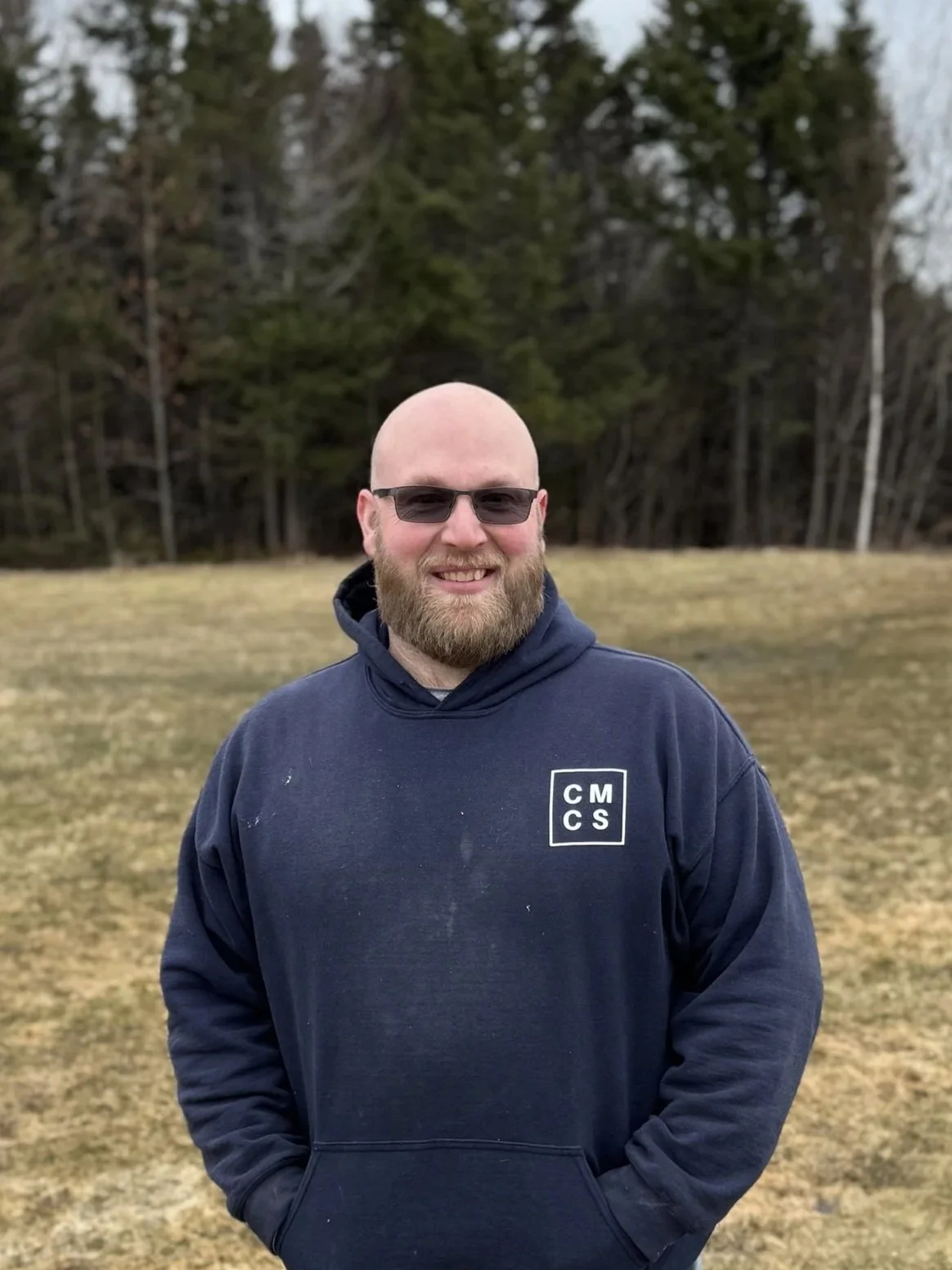 Craig McNally Contracting Services Ltd. Logo