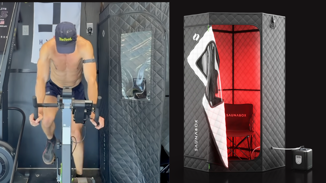 A man wearing a cap labeled 'The Feed' is exercising on a stationary bike inside a padded, fabric sauna with a clear window on the door. Next to him is a portable oxygen concentrator connected via a tube to the sauna, with a black chair branded 'SaunaBox' illuminated by red lighting inside.