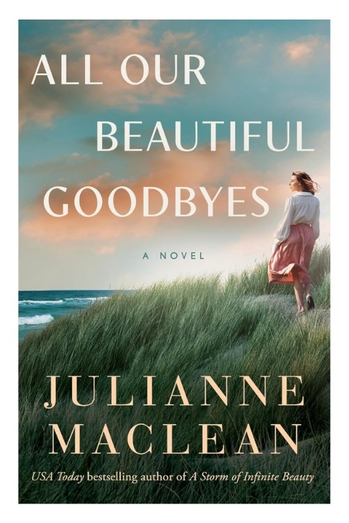 Book cover of All Our Beautiful Goodbyes by Julianne Maclean. Image shows a woman looking towards the sea.