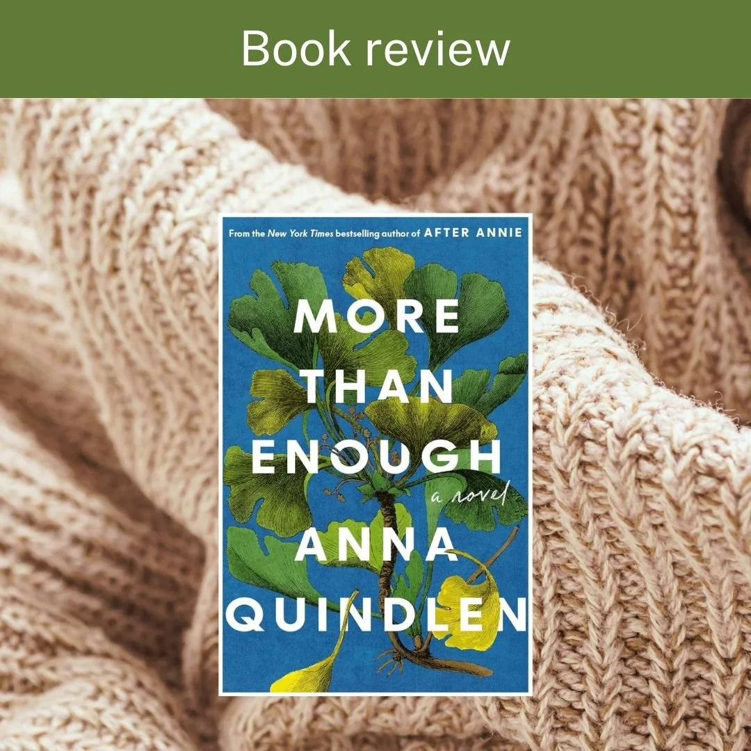 More Than Enough book sits on a sweater