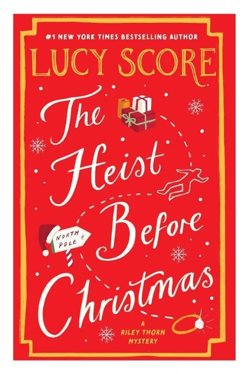 Book cover of The Heist Before Christmas by Lucy Score