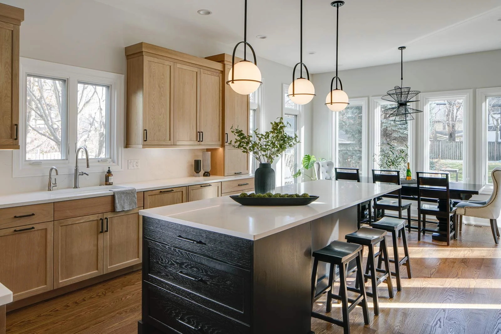 Timeless-Kitchen_Chicago_Dark-craftsman_Island_Sink_Dining-Area_Drury-Design.jpg