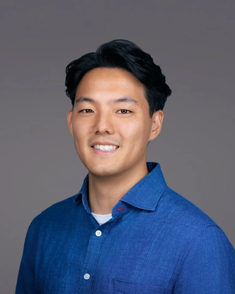 Corporate team headshot 3 of 6, matching gray backdrop, photographed on-site by Steven B Studios in the East Bay