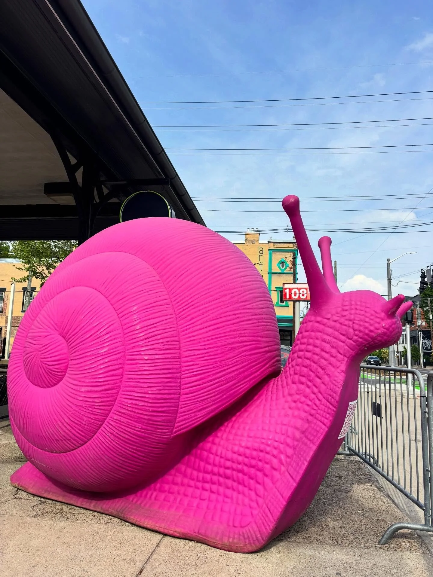 👀 You never know what you&rsquo;ll see in NuLu! 🐌💗 Part of a herd of 35 pink snails, these two inched their way over to NuLu! Come by to see them before they continue their migration to 21c Museum Hotel just in time for Derby.