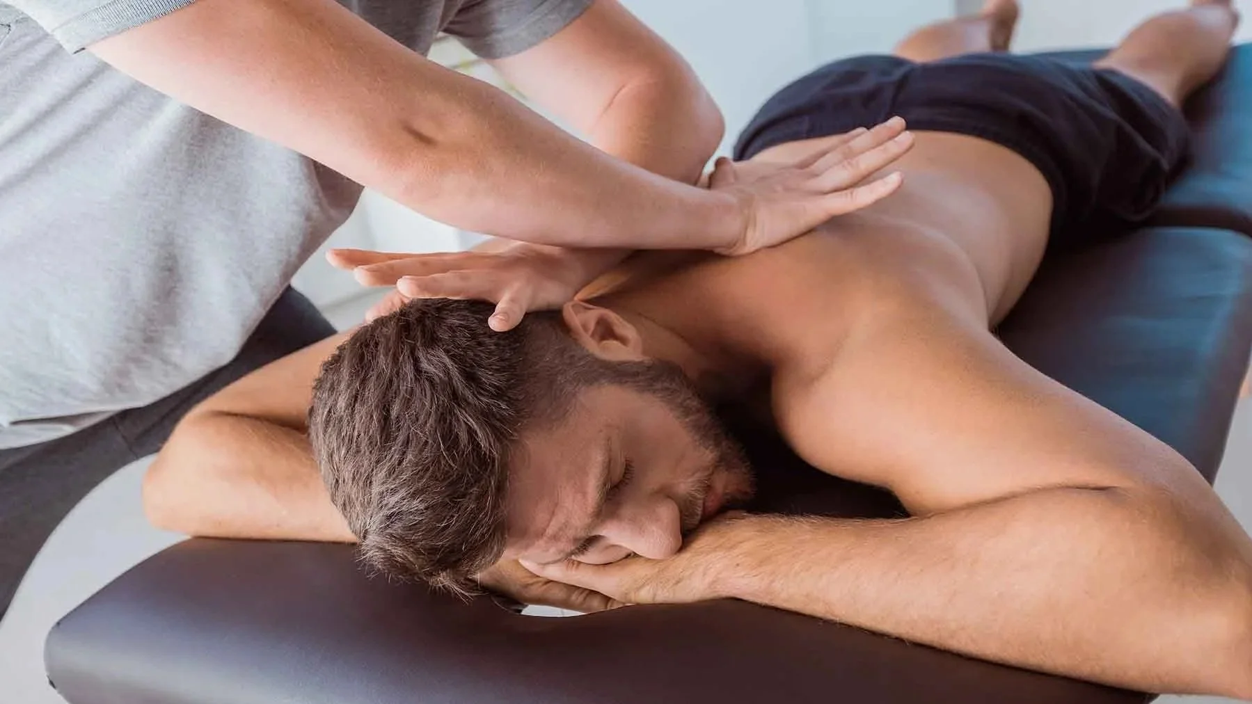 Customized massage therapy for neck, shoulder, and muscular pain at J9Massage & Beyond in Longmont, Colorado